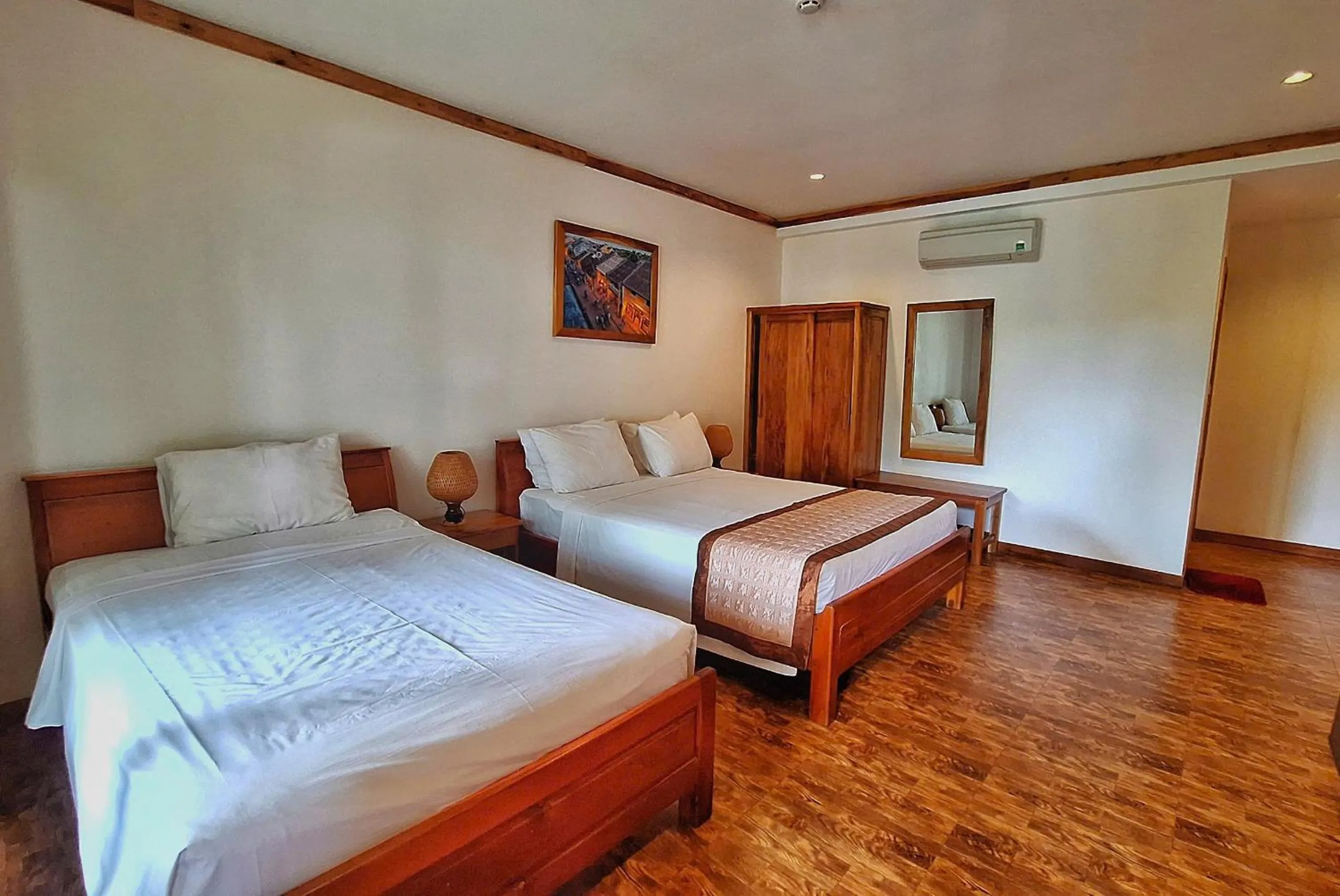 Bed in Ancarine Beach Resort