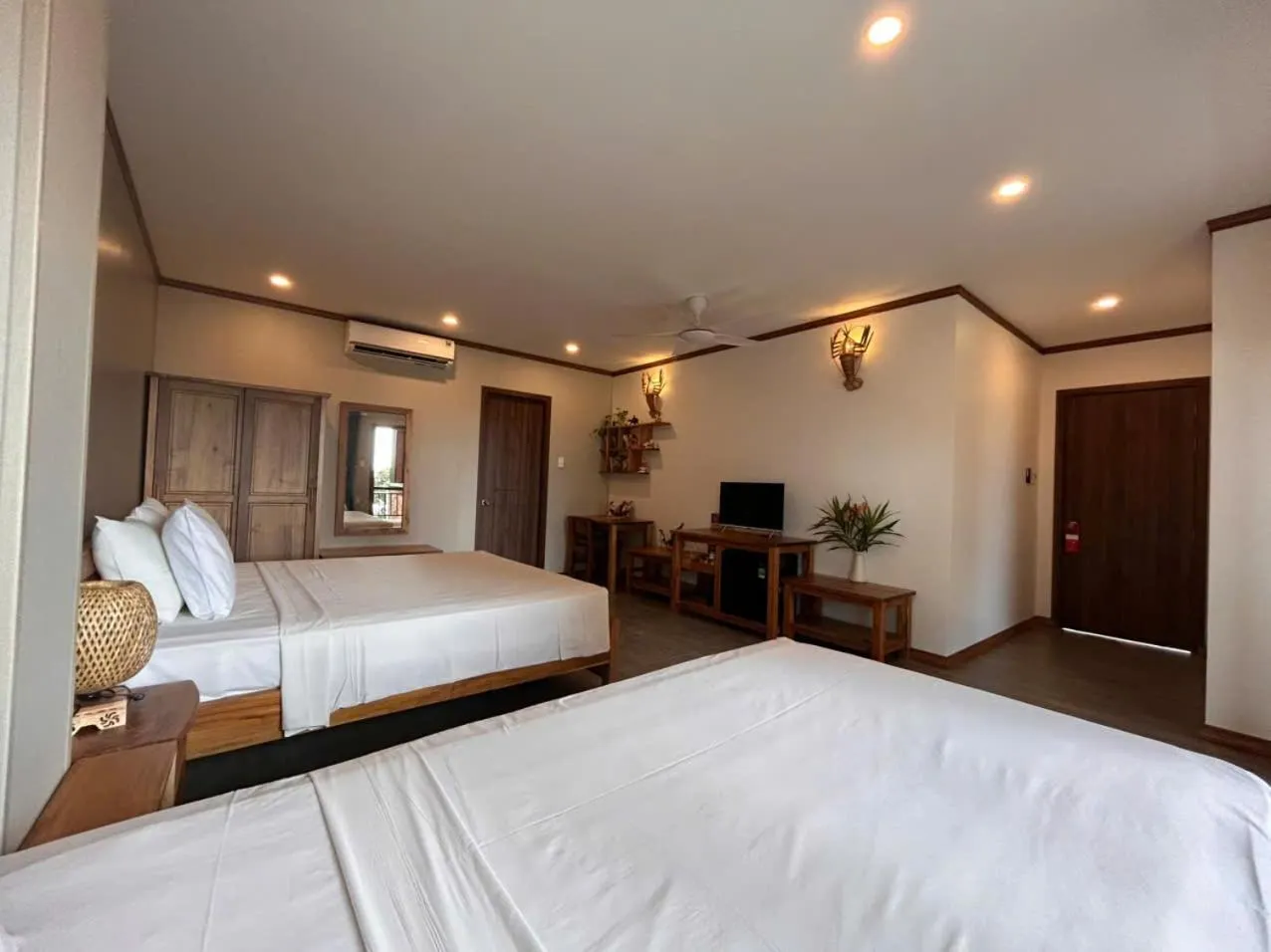 Bed in Ancarine Beach Resort