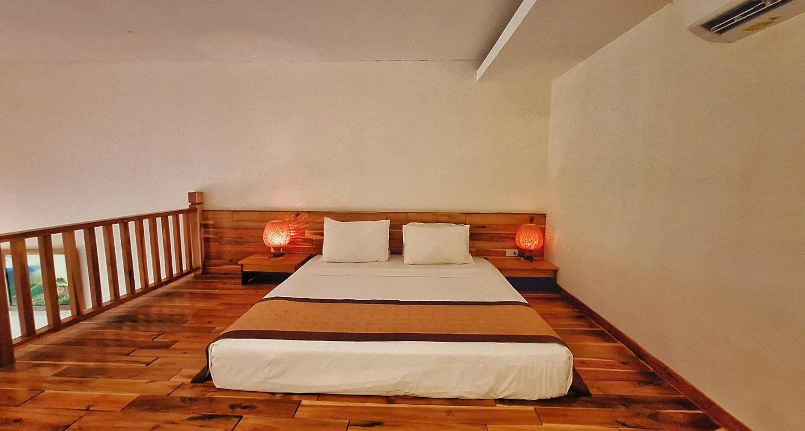 Bed in Ancarine Beach Resort