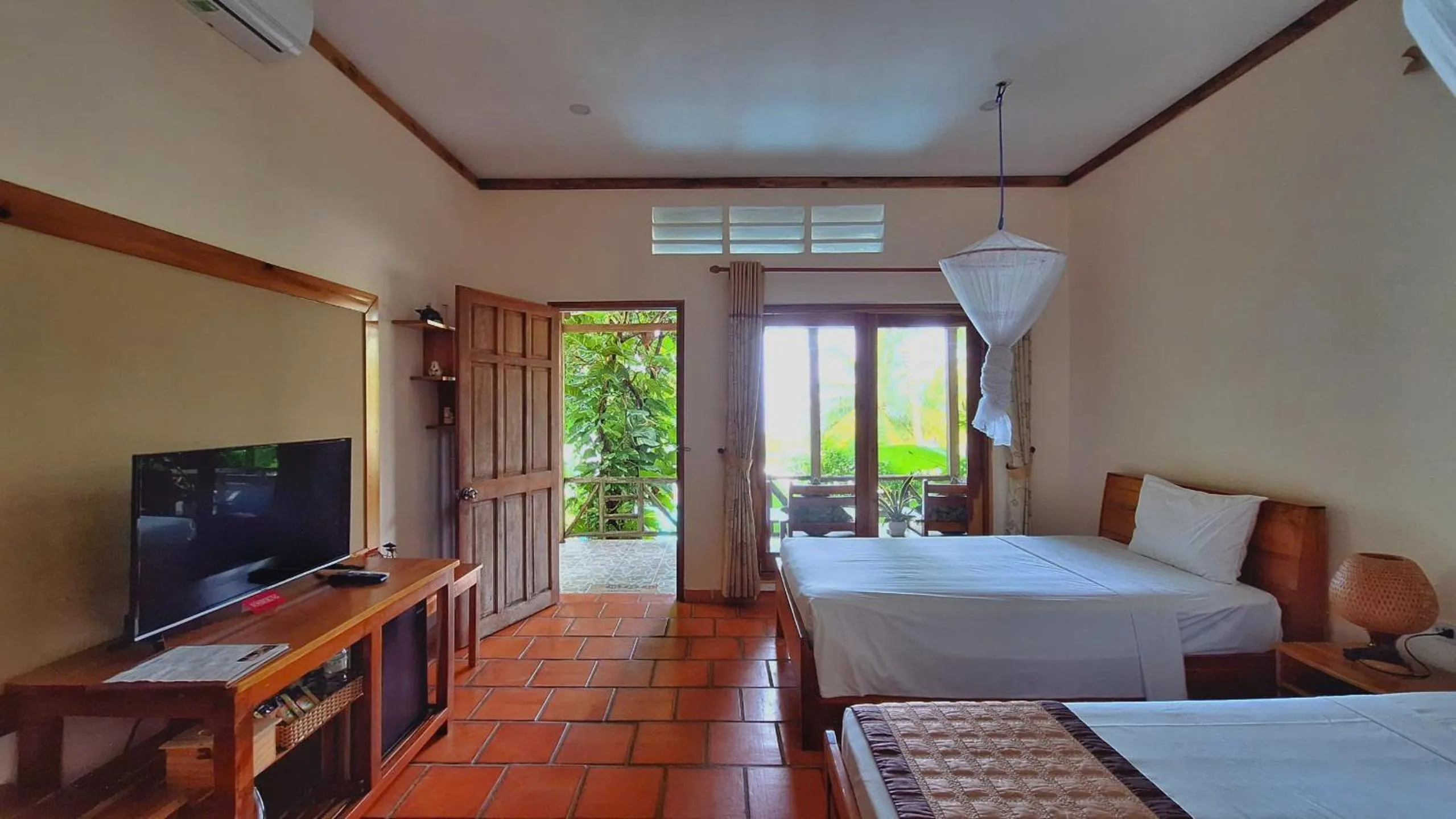 Bed in Ancarine Beach Resort