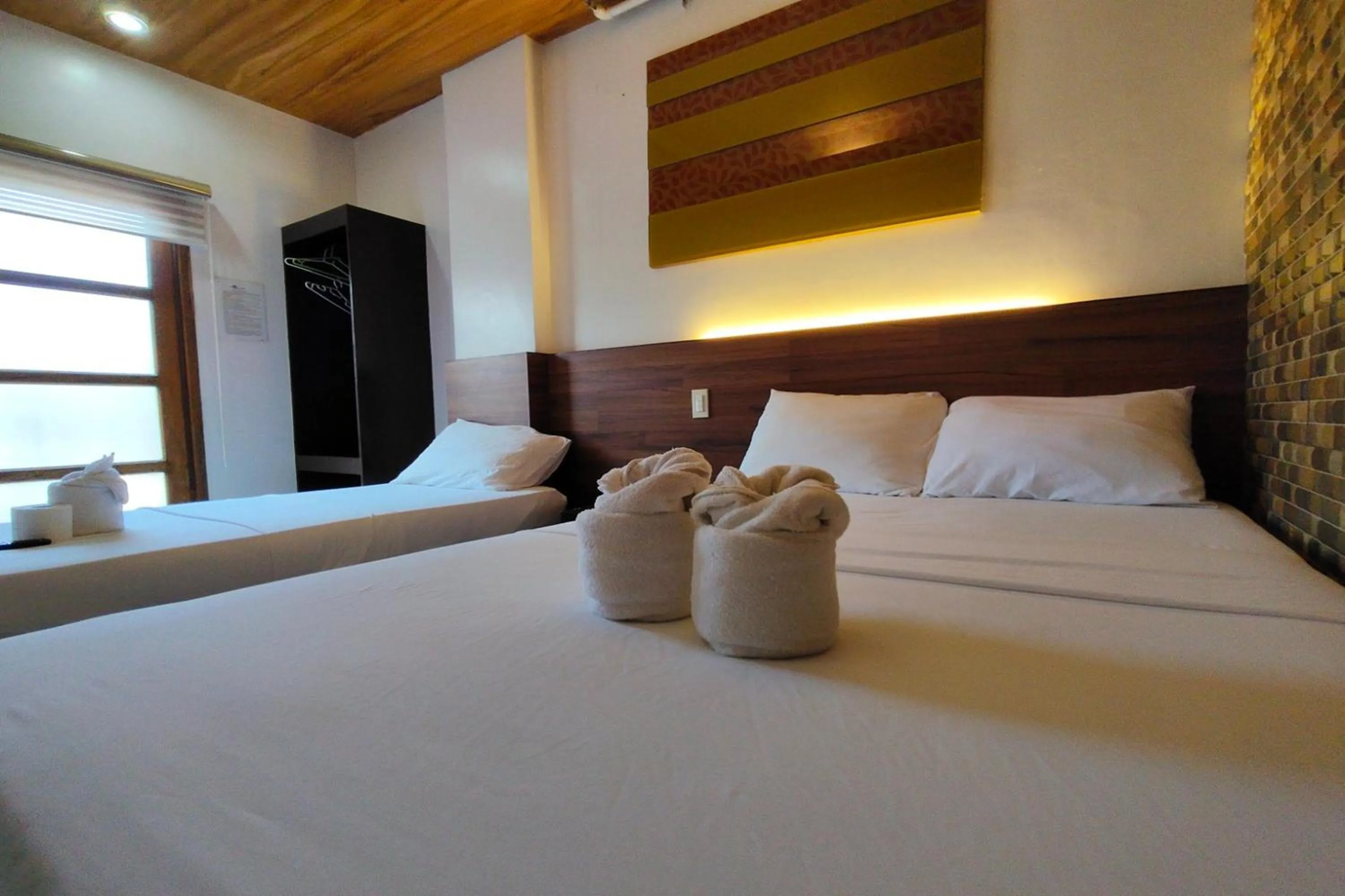 Bed in Taj Guesthouse Boracay