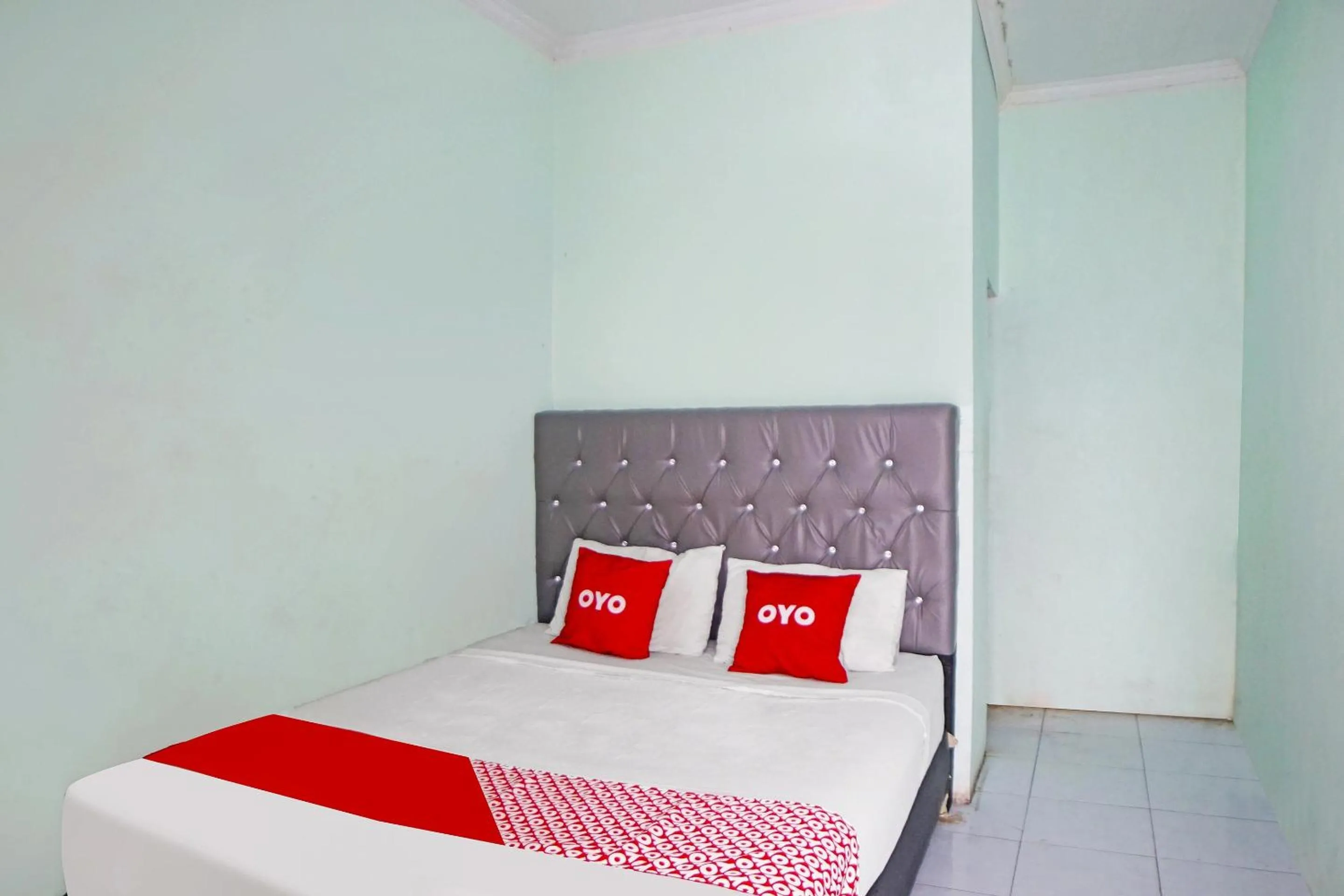 Bedroom in Hotel O Puri Dennis