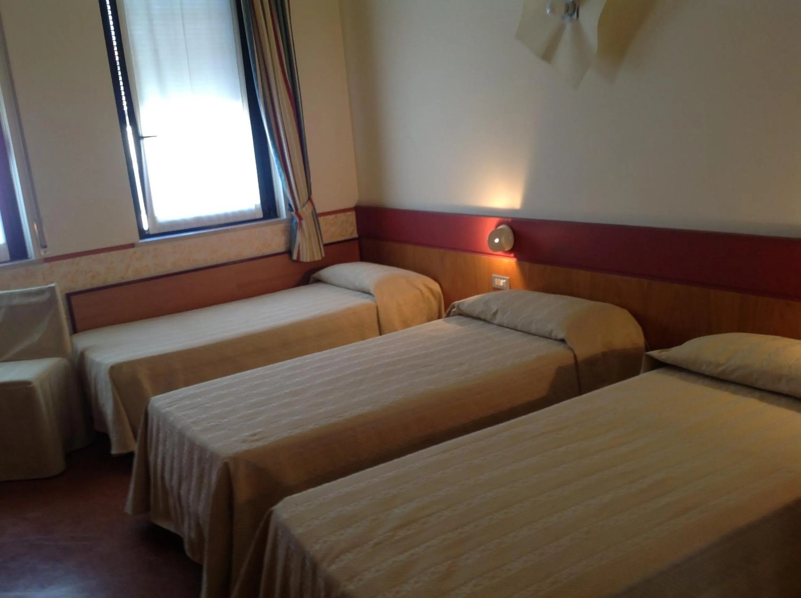 Bed in Hotel Roma