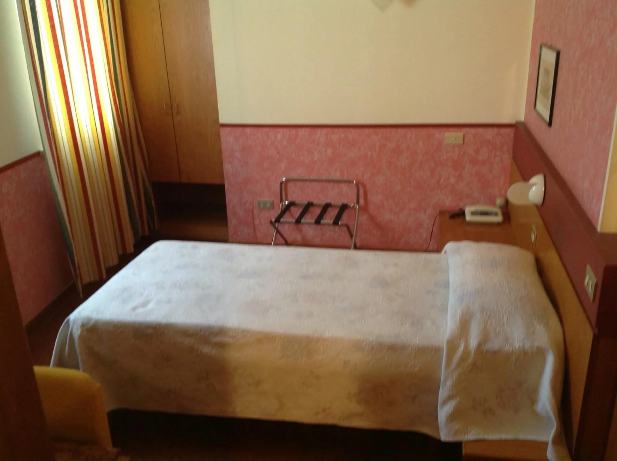 Bed in Hotel Roma
