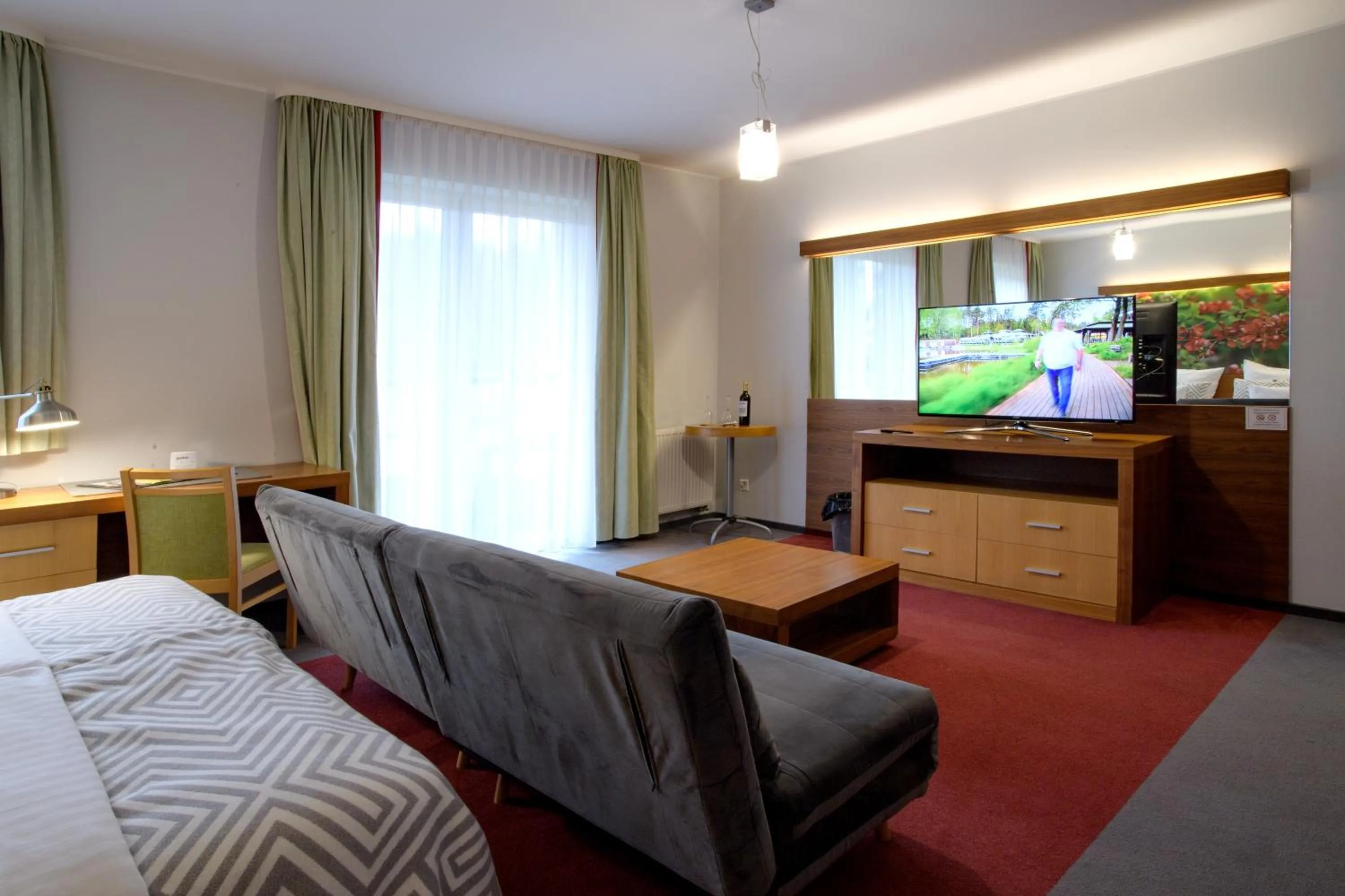 Communal lounge/ TV room, Bed in Hotel Szarlota - Kompleksowo na Kaszubach