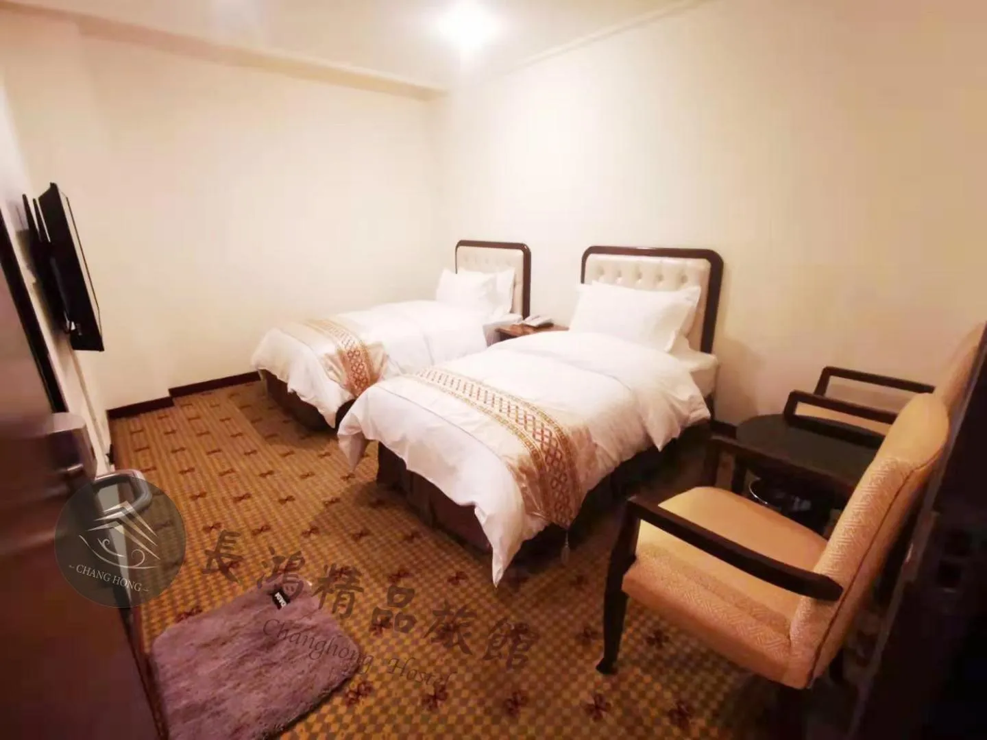 Bed in Chang Hong Hotel