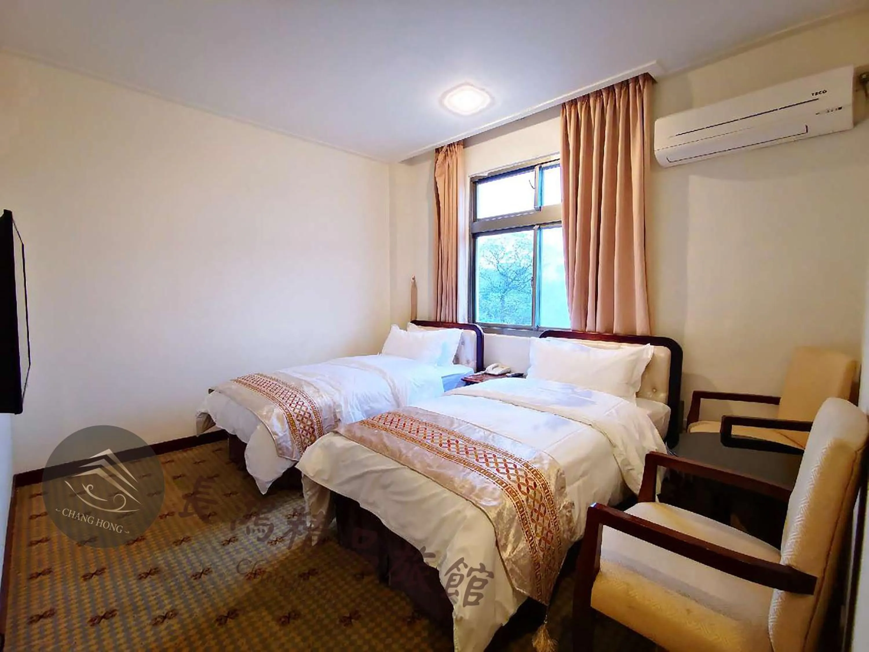 Bed in Chang Hong Hotel