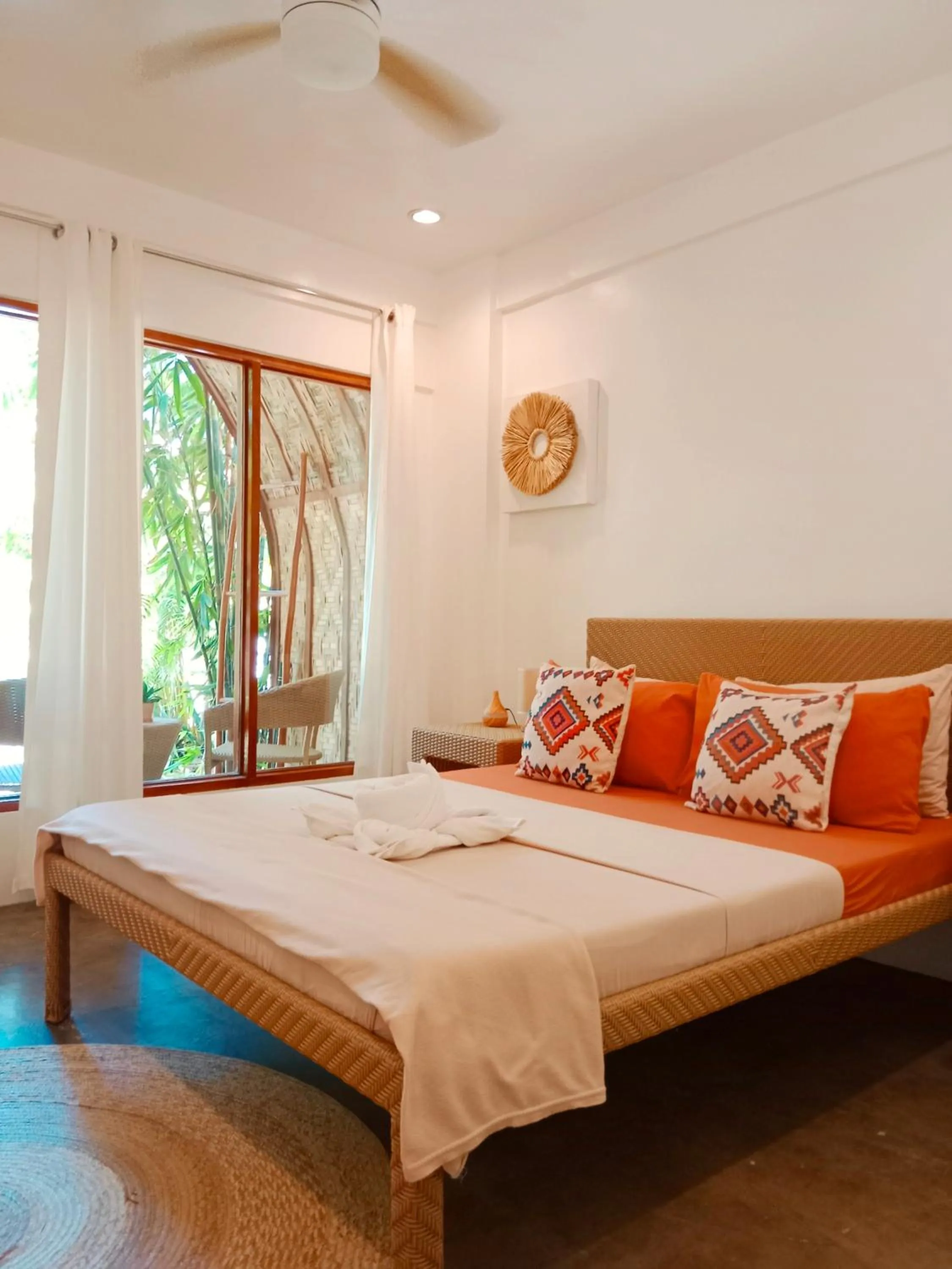 Bed in Tropical Temple Siargao Resort