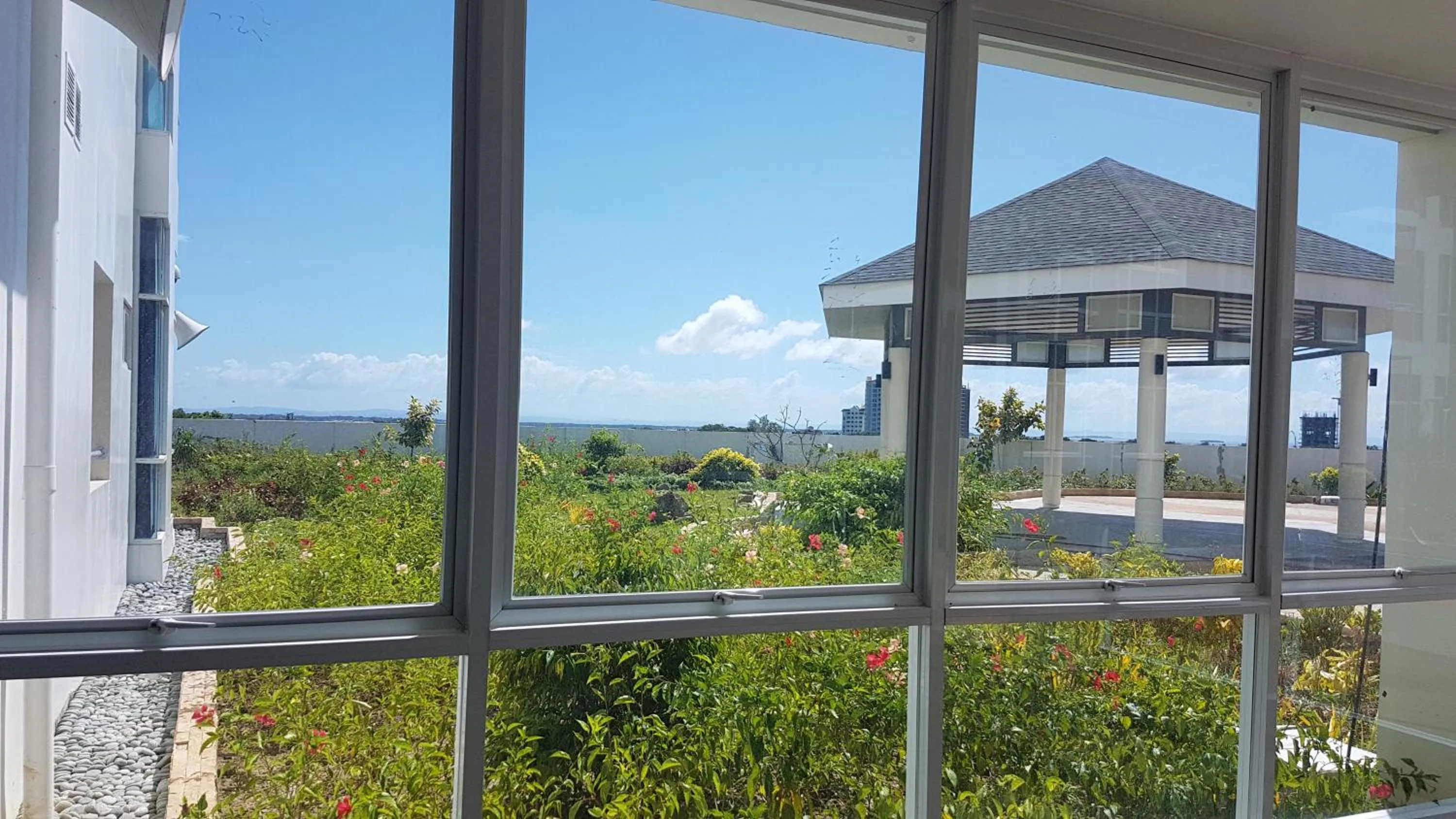 Property building in Mactan Newtown Condo with Garden and Ocean View 8NEWTOWN BLVD
