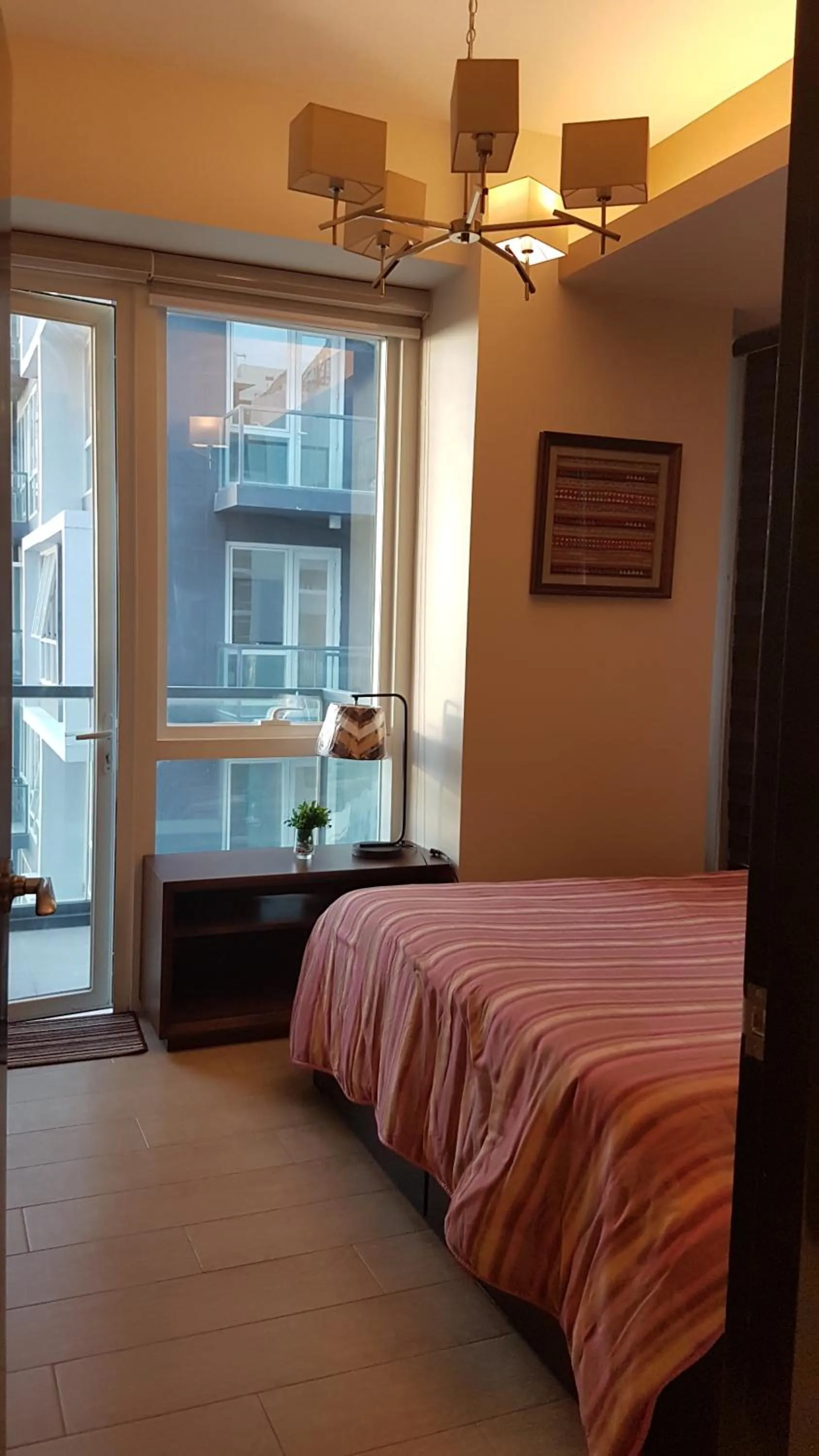 Bed in Mactan Newtown Condo with Garden and Ocean View 8NEWTOWN BLVD