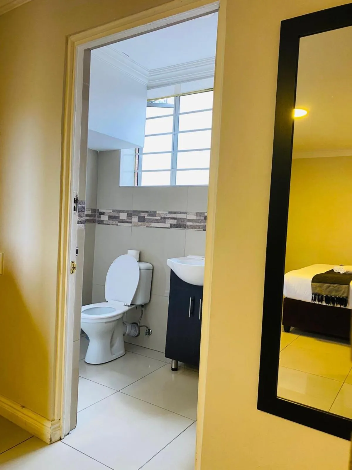 Bathroom in Bayside Hotel 97 Russell Street