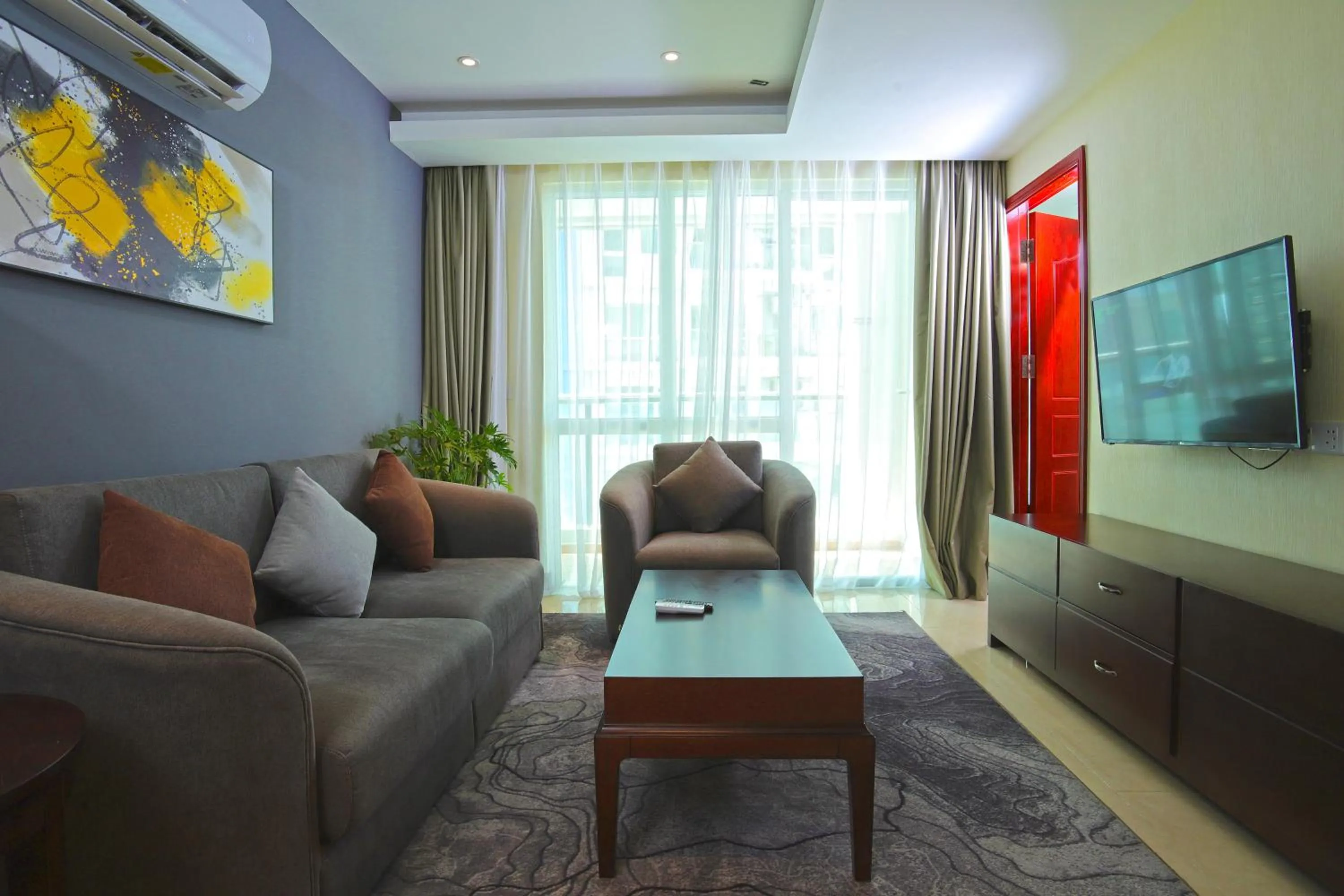 Living room in Olympia City Hotel by Dara