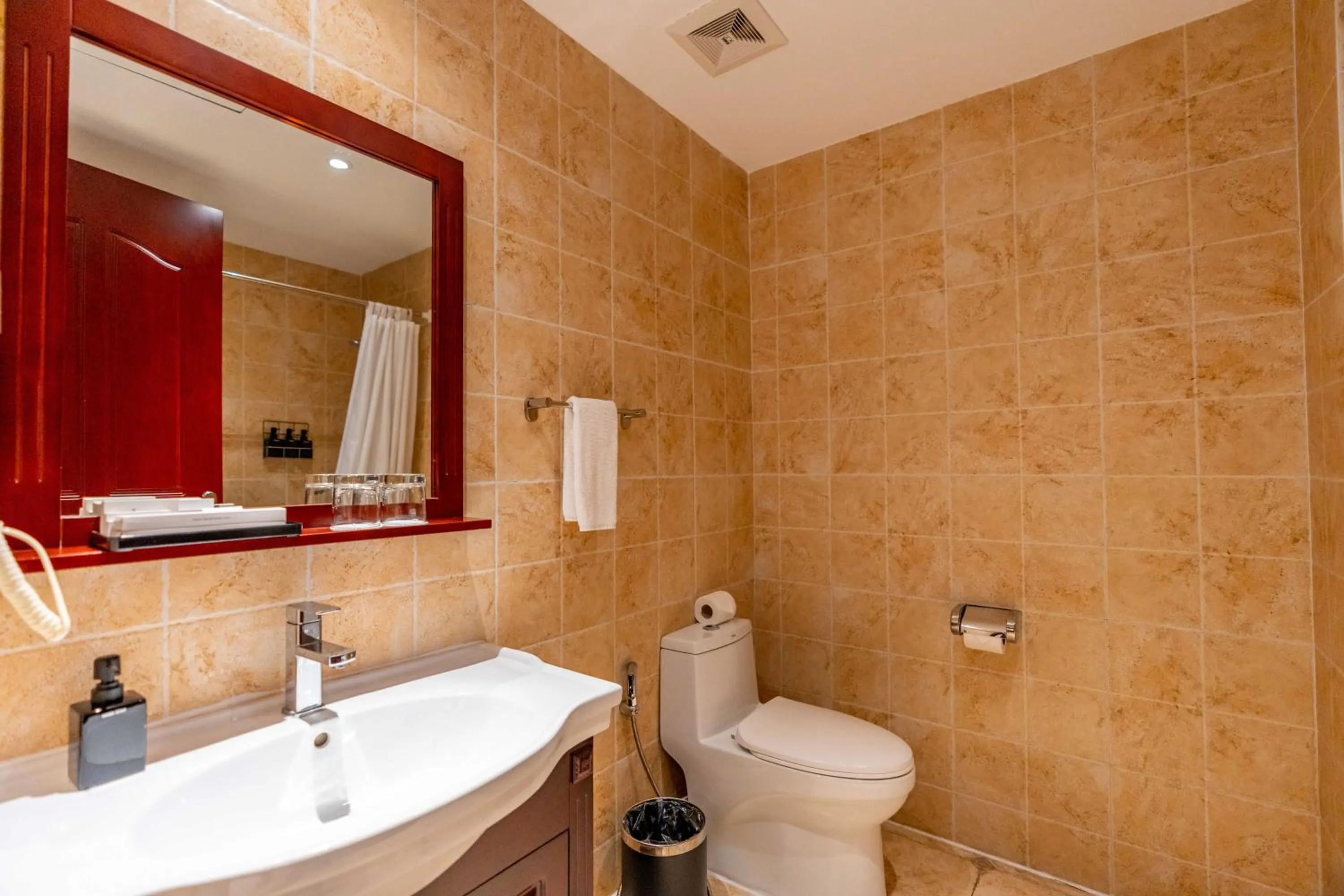 Bathroom in Olympia City Hotel by Dara