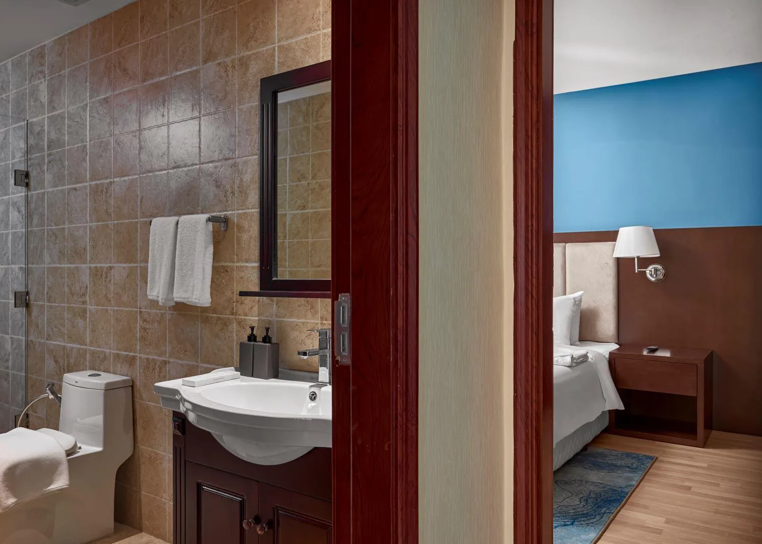 Toilet in Olympia City Hotel by Dara