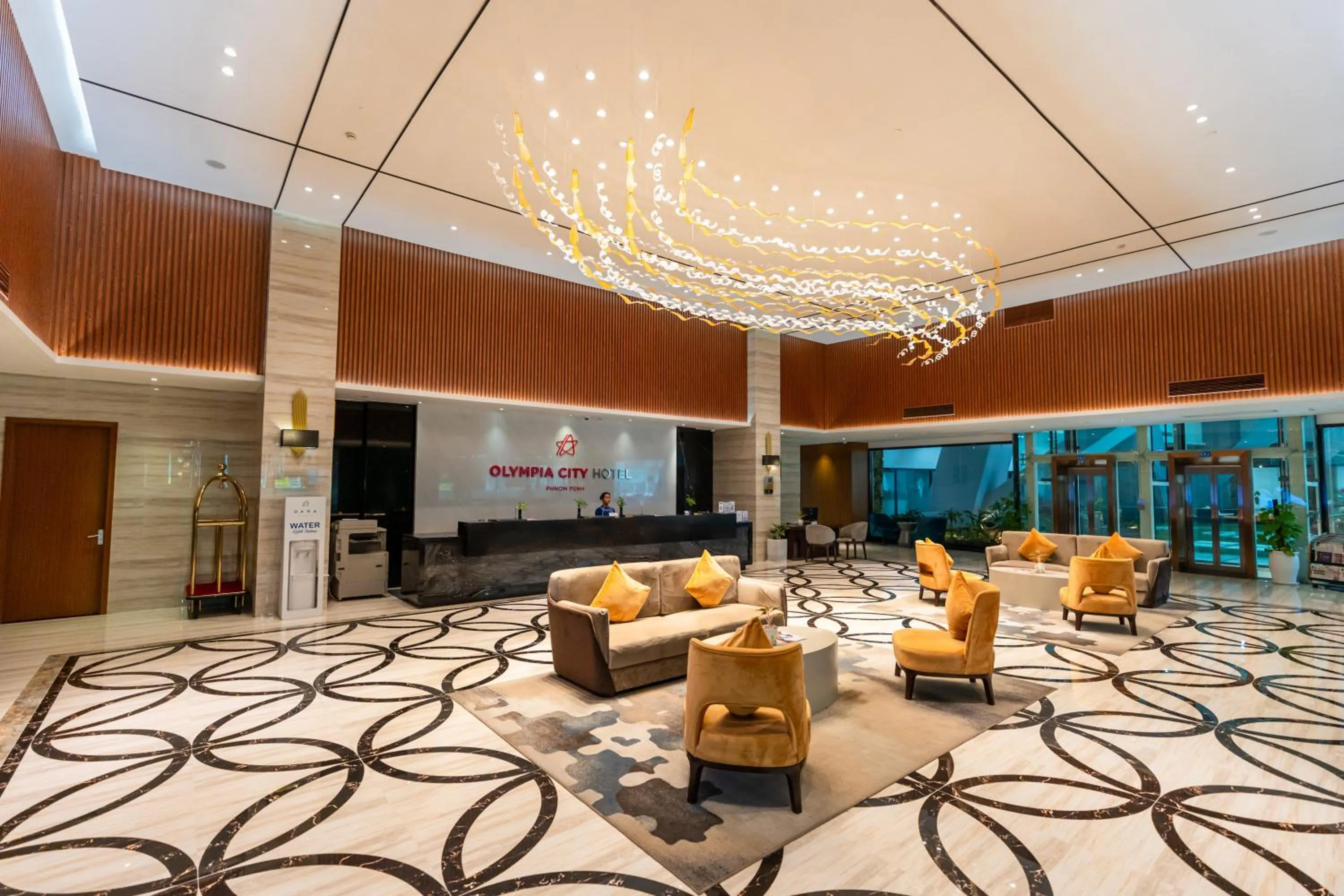 Lobby or reception in Olympia City Hotel by Dara