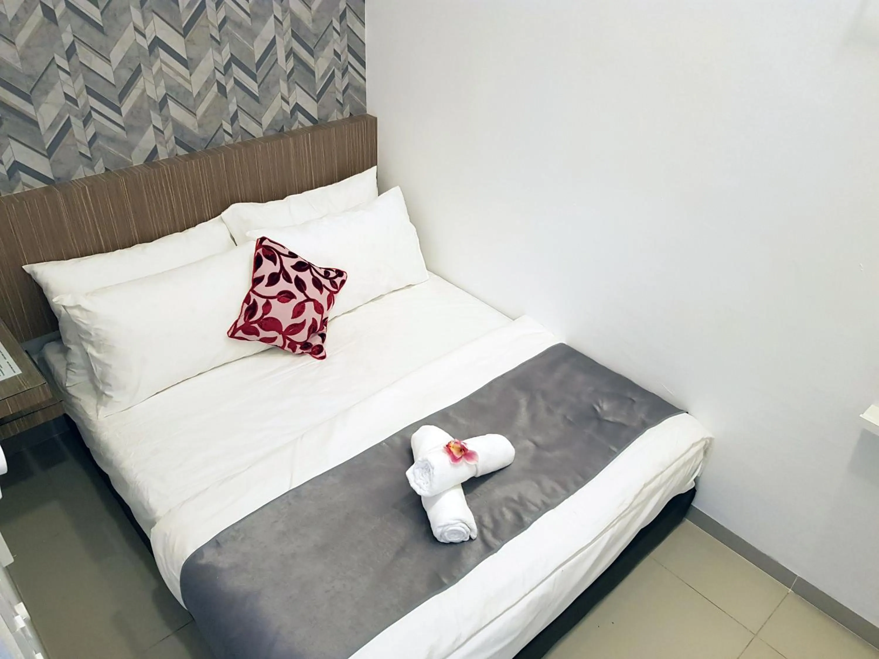 Bed in Teruntum 96 Guest house