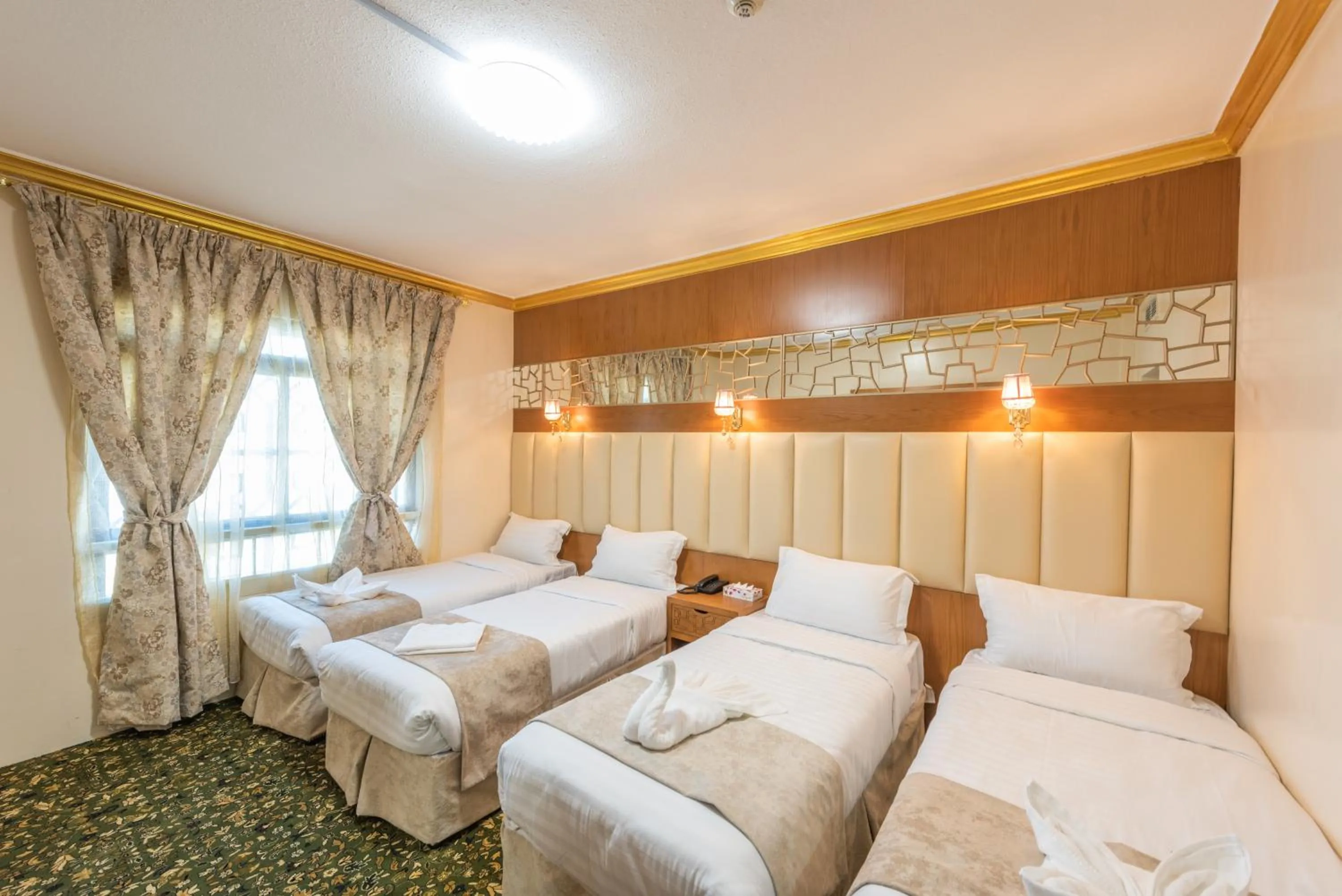 Bed in Grand Zowar Hotel