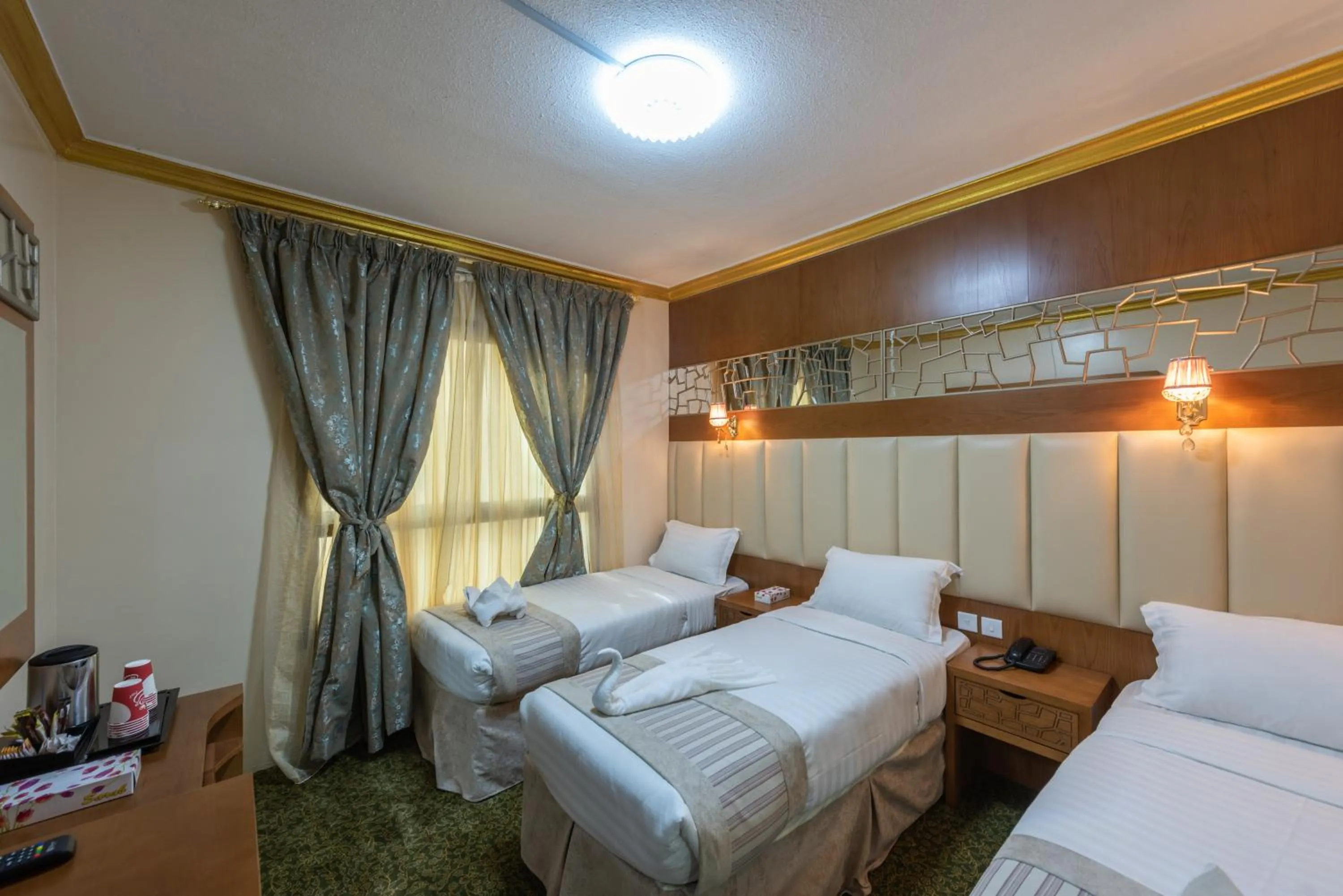 Bed in Grand Zowar Hotel