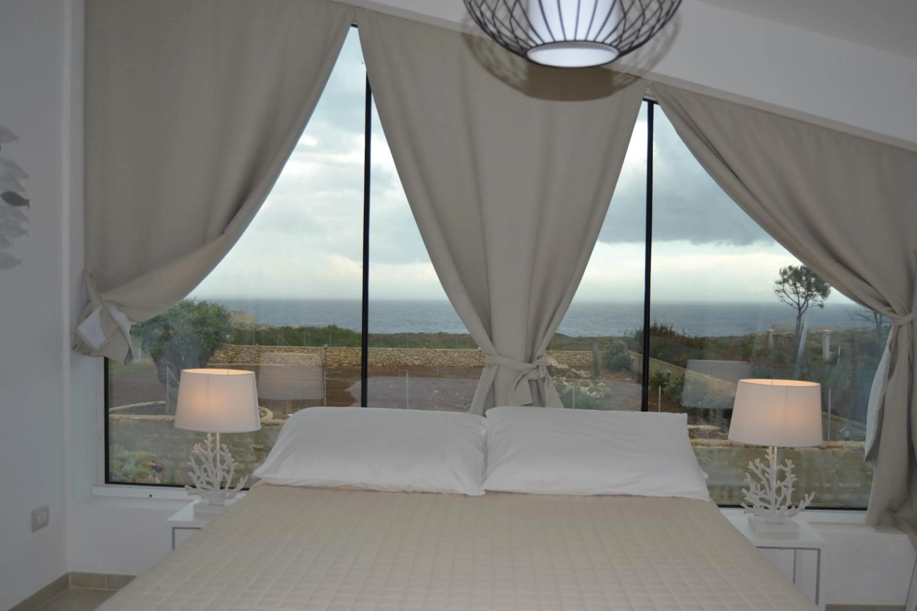 Sea view, Bed in CORALLI DEL PLEMMIRIO