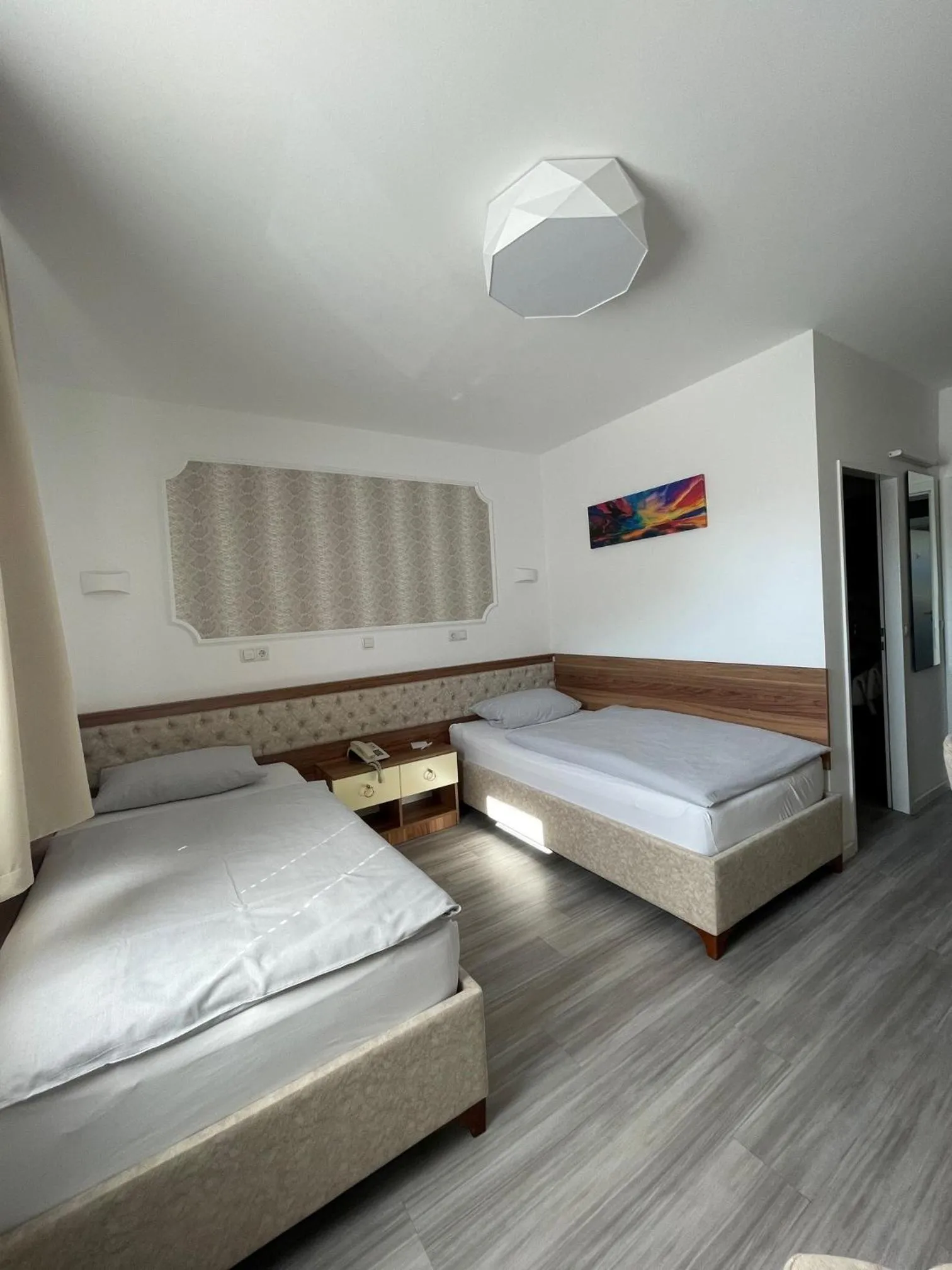 Bed in Hotel Rosenheim