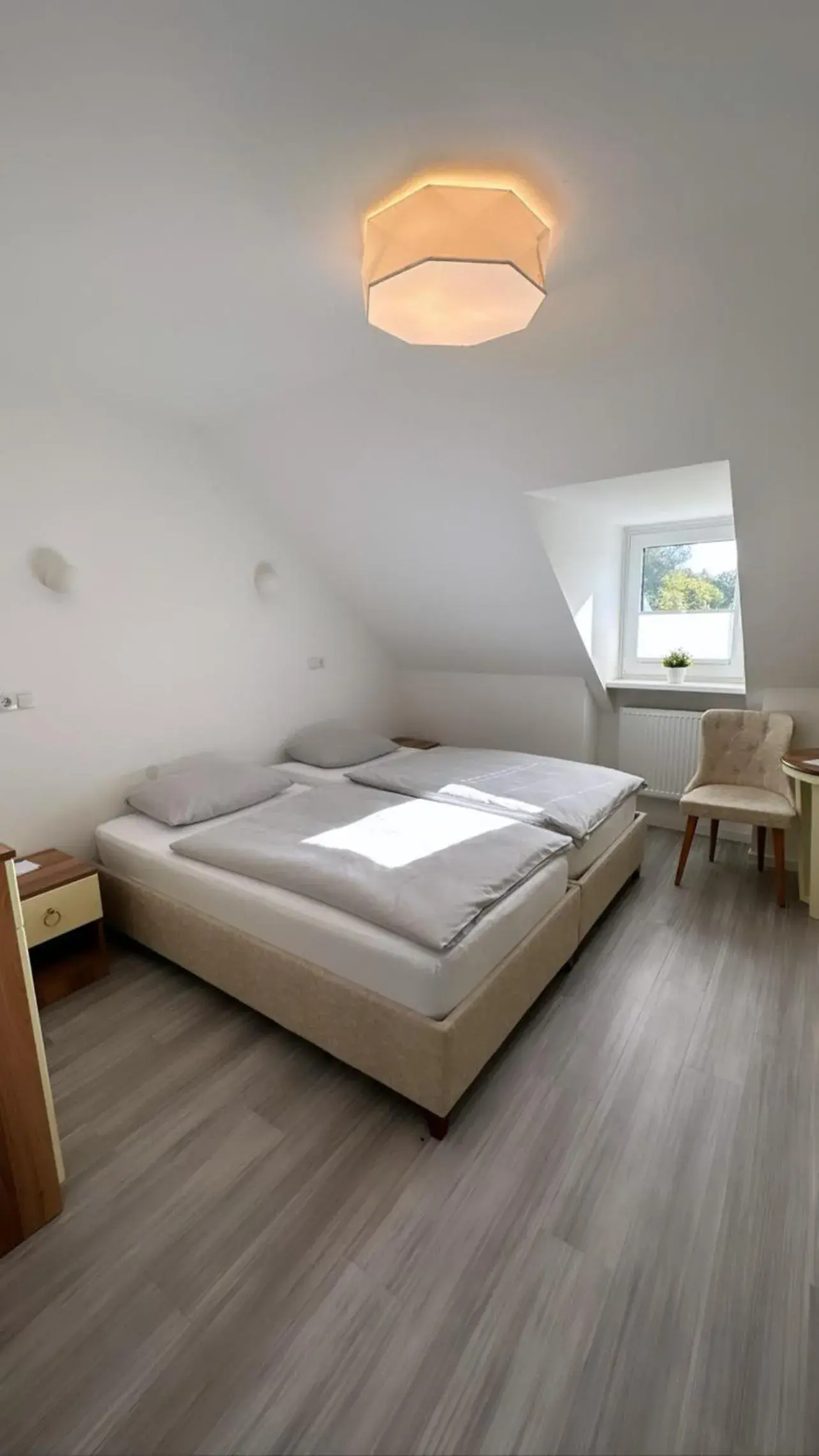 Standard Double Room with Shared Bathroom - single occupancy in Hotel Rosenheim Standard Double Room with Shared Bathroom - single occupancy in Hotel Rosenheim