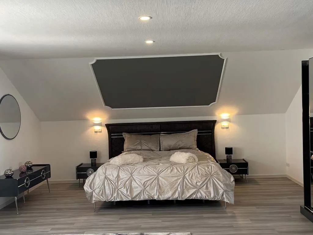 Bed in Hotel Rosenheim