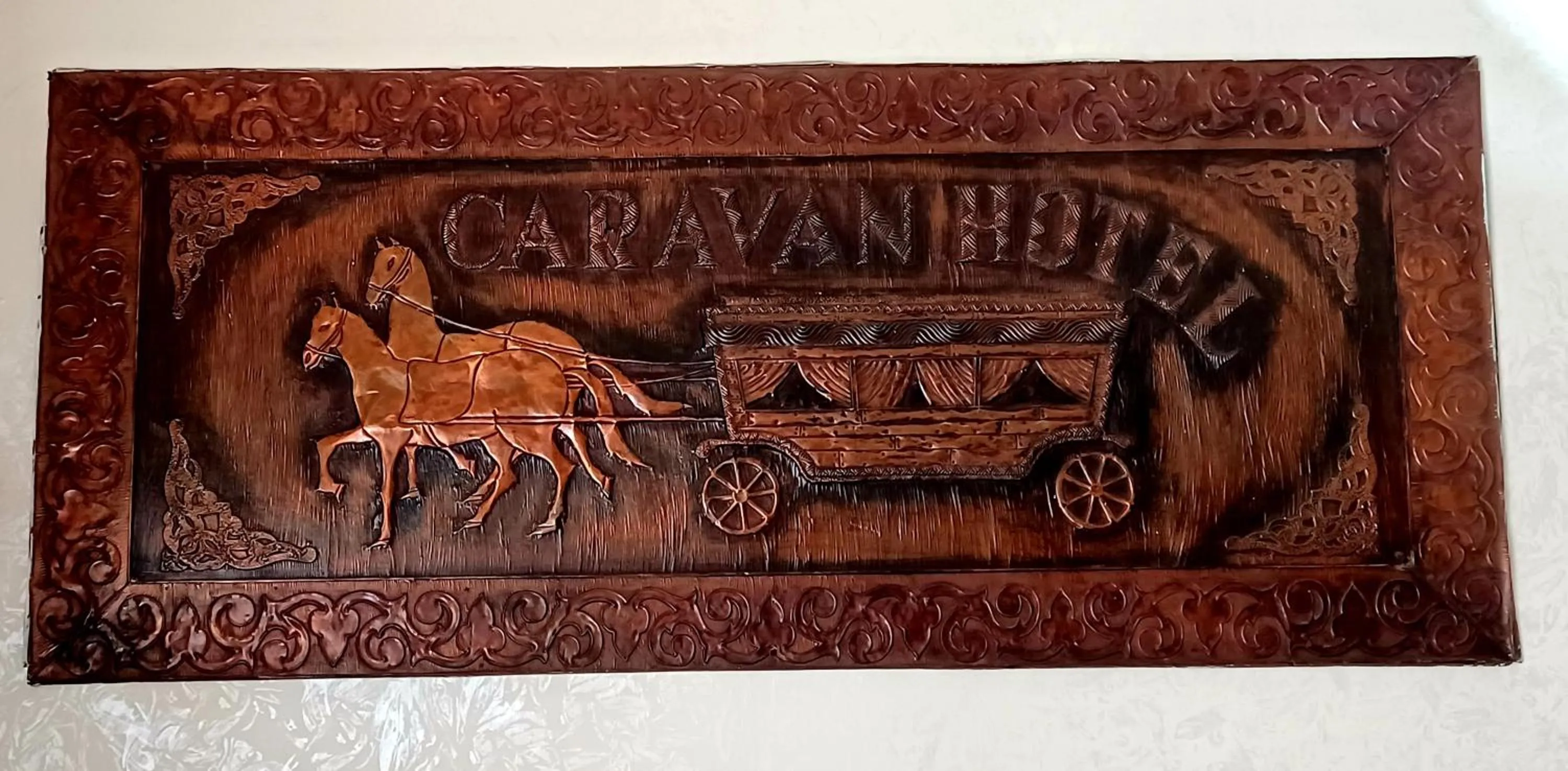 Property logo or sign in Caravan Hotel