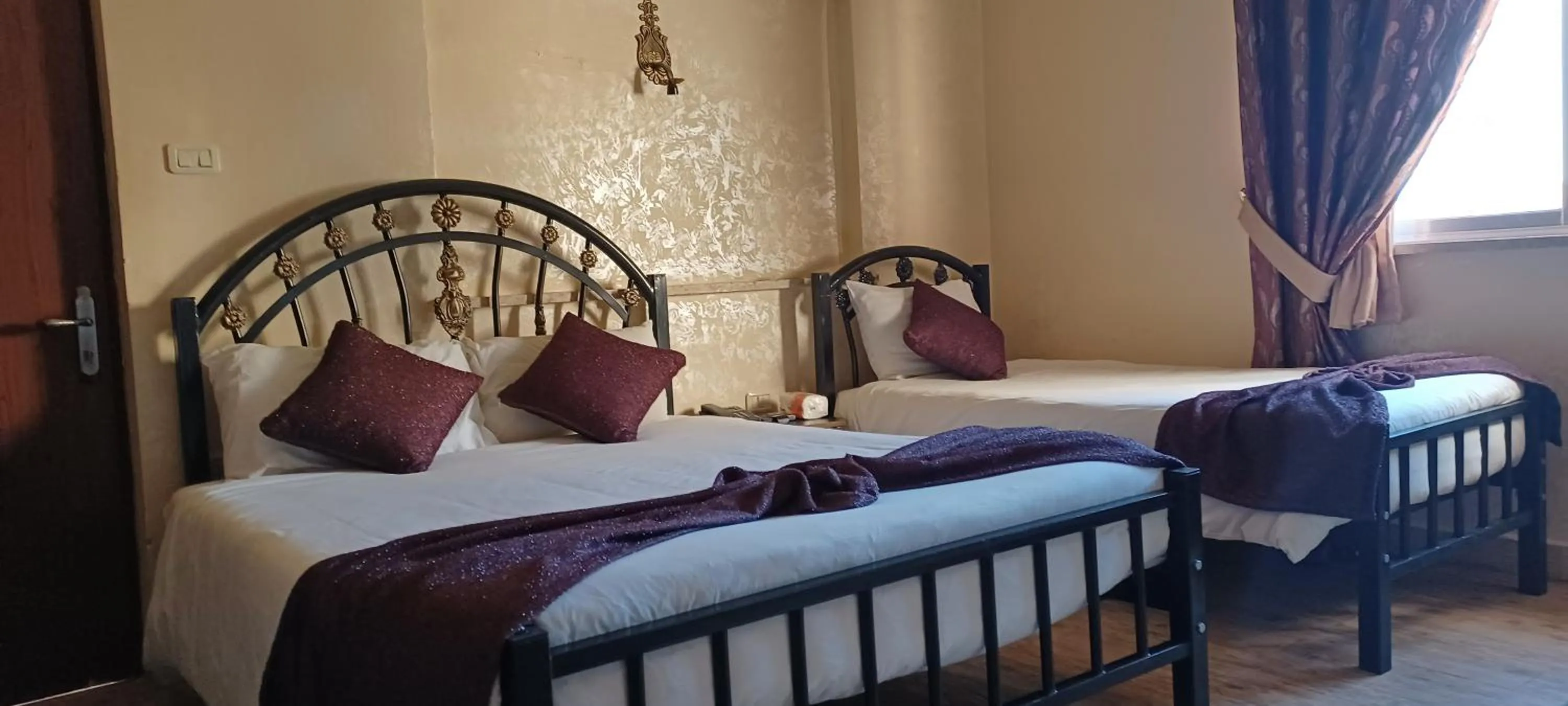 Bed in Caravan Hotel