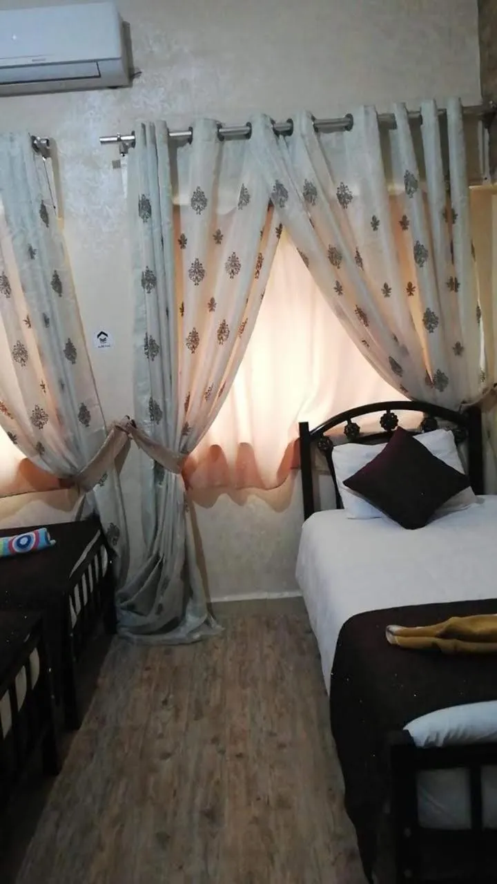 Bed in Caravan Hotel