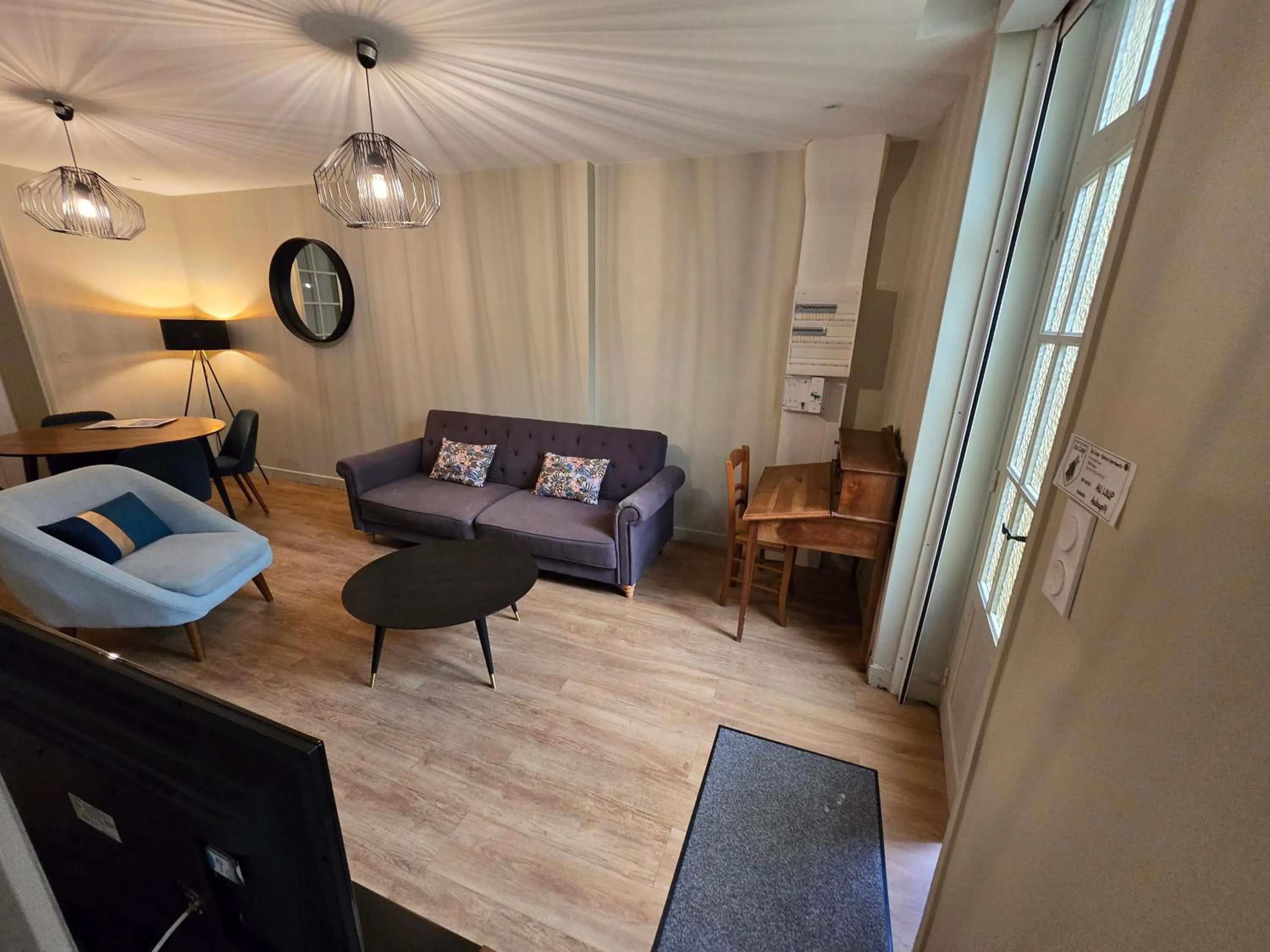 Living room, Bed in Au Loup Historic Apartments