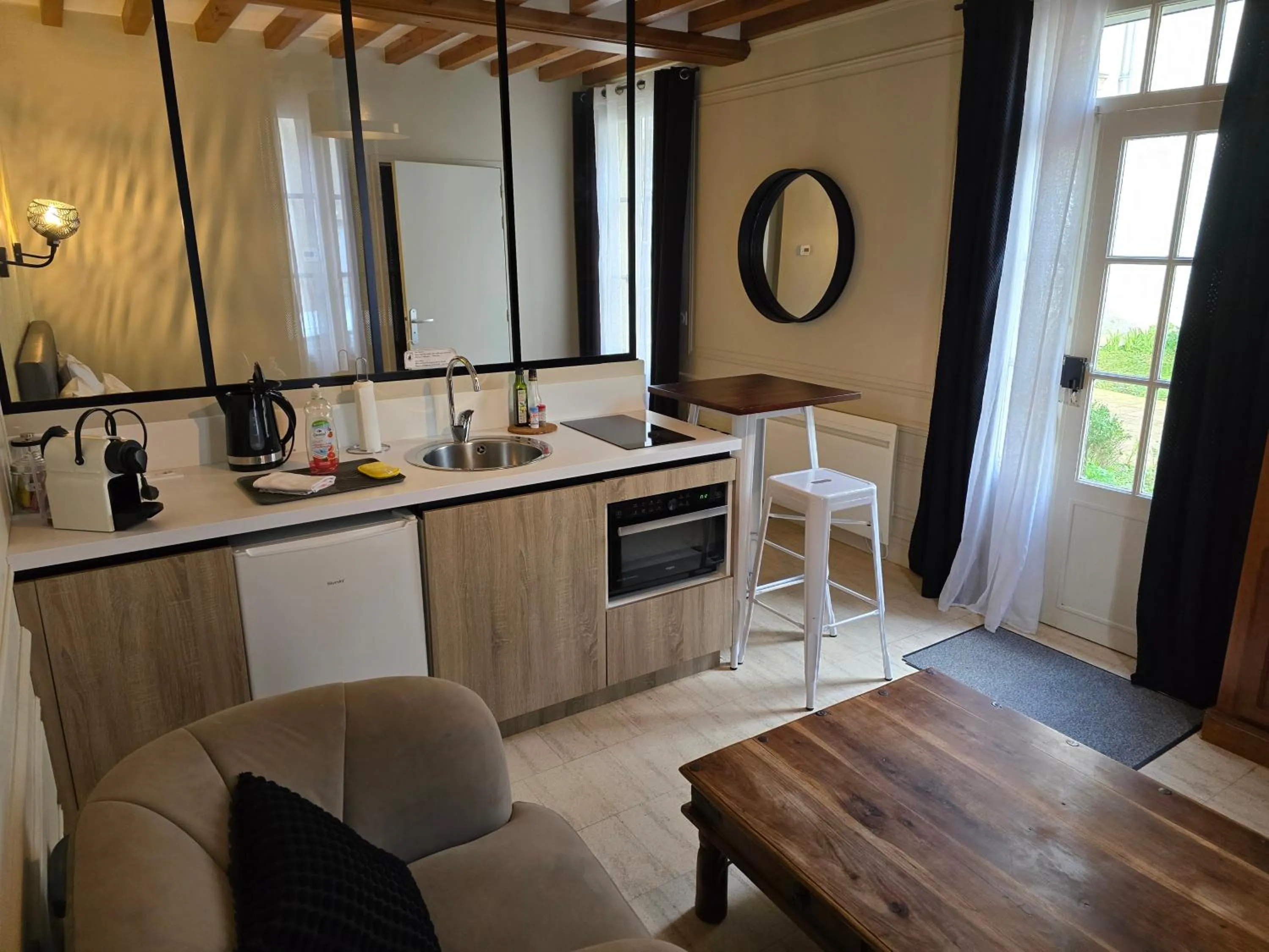 Kitchen or kitchenette in Au Loup Historic Apartments