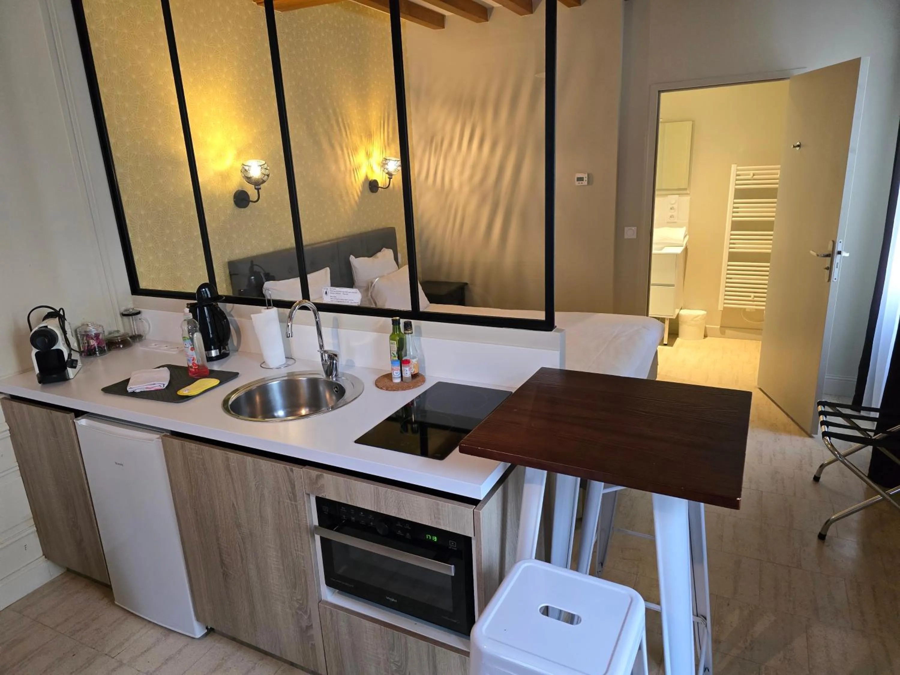 Kitchen or kitchenette in Au Loup Historic Apartments