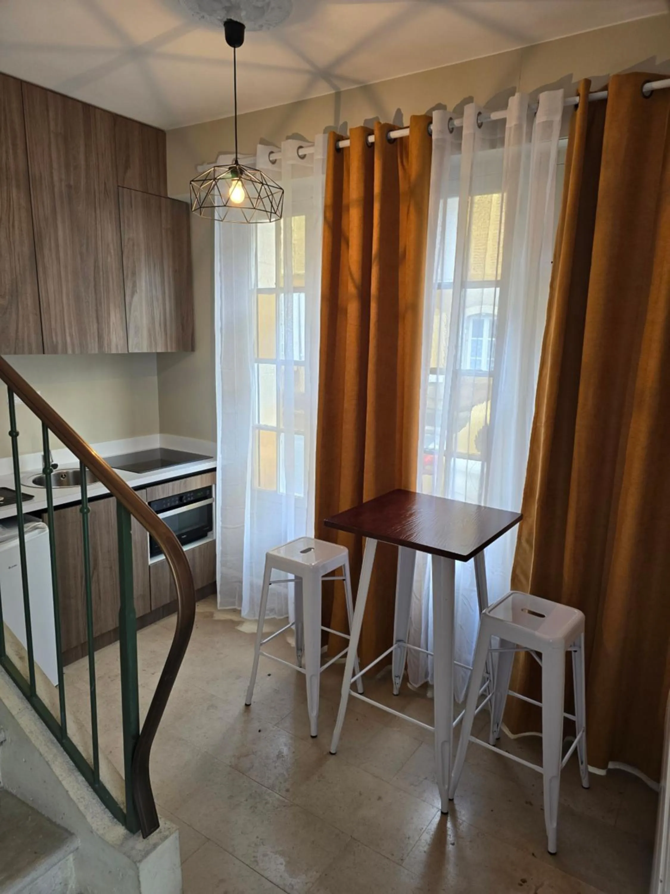 Kitchen or kitchenette in Au Loup Historic Apartments