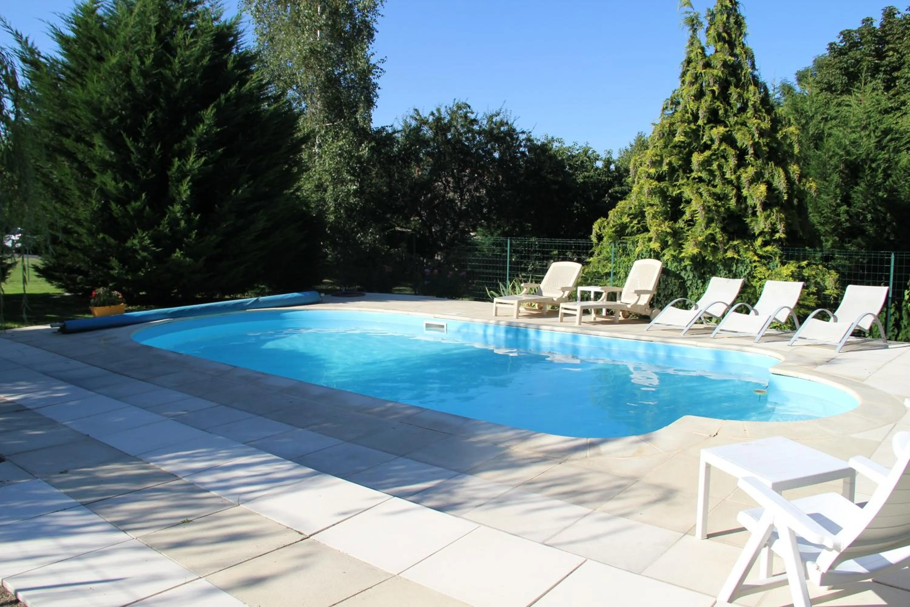 Swimming pool in Chambres d'hôtes les Etoiles