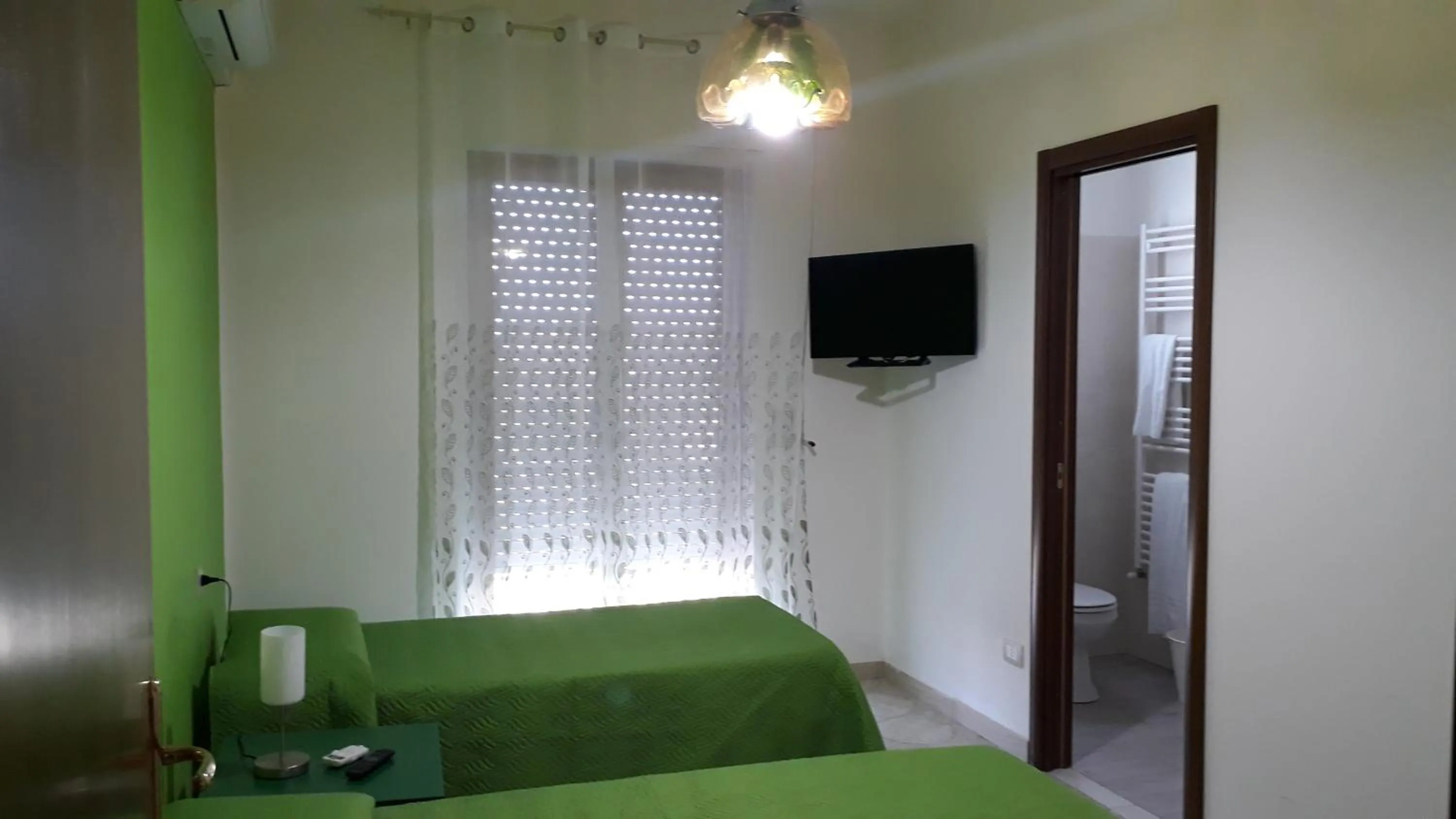 Photo of the whole room, Bed in LA CASA DI MAMMA 'NTO