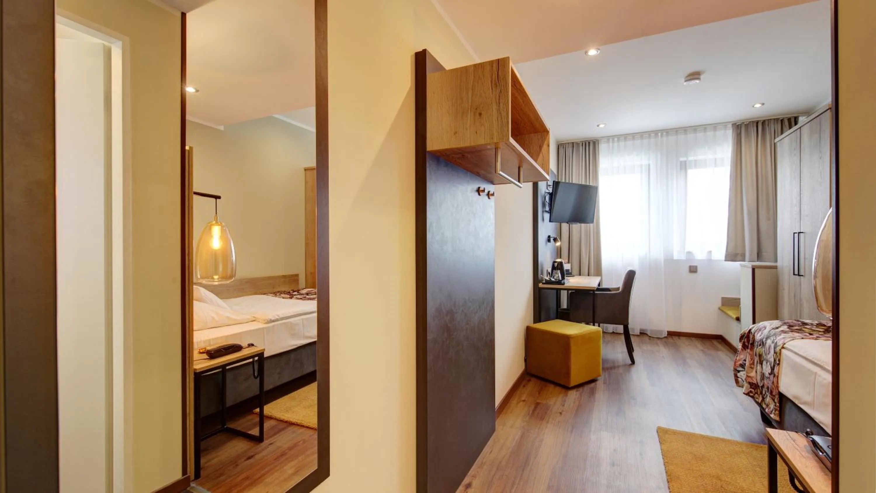 Living room, Bed in Hotel Spahr