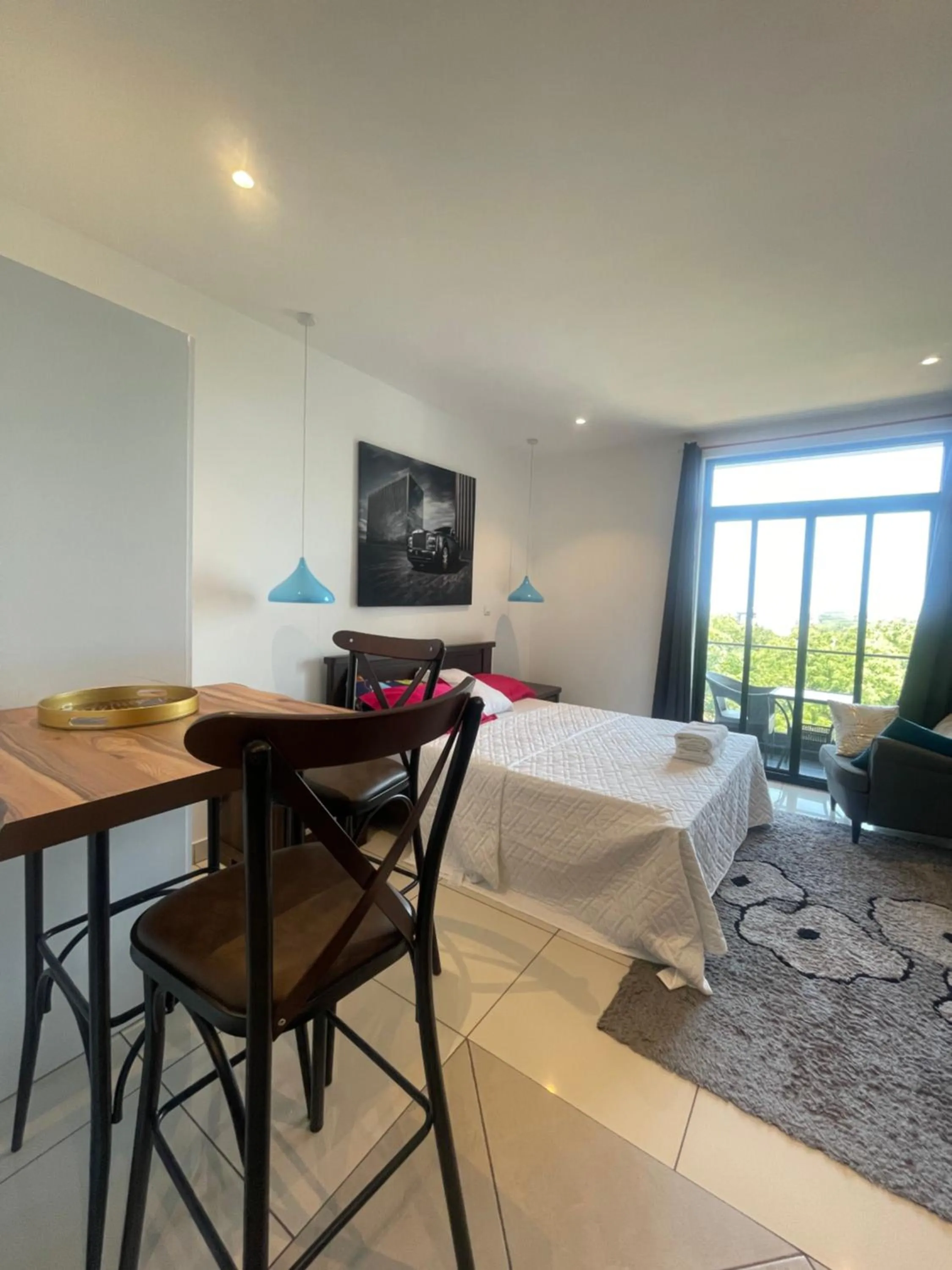 Bed in Nukville Studio Apartment at Embassy Garden