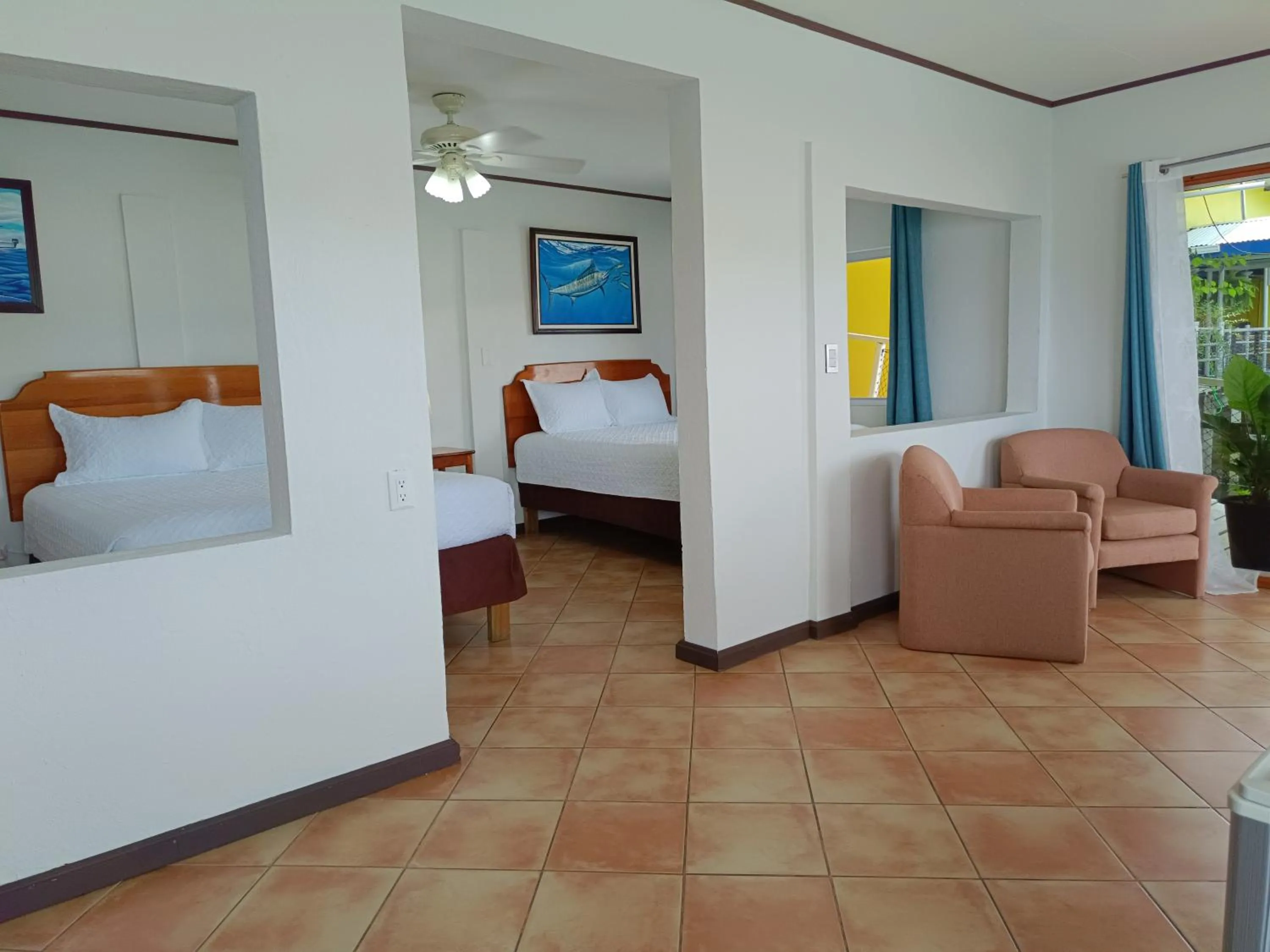 Photo of the whole room, Bed in Banana Bay Marina