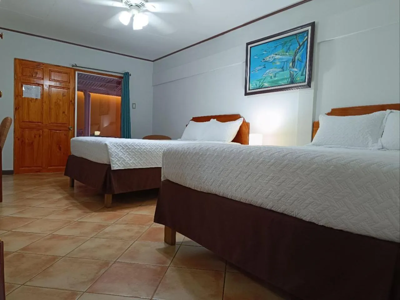 Photo of the whole room, Bed in Banana Bay Marina