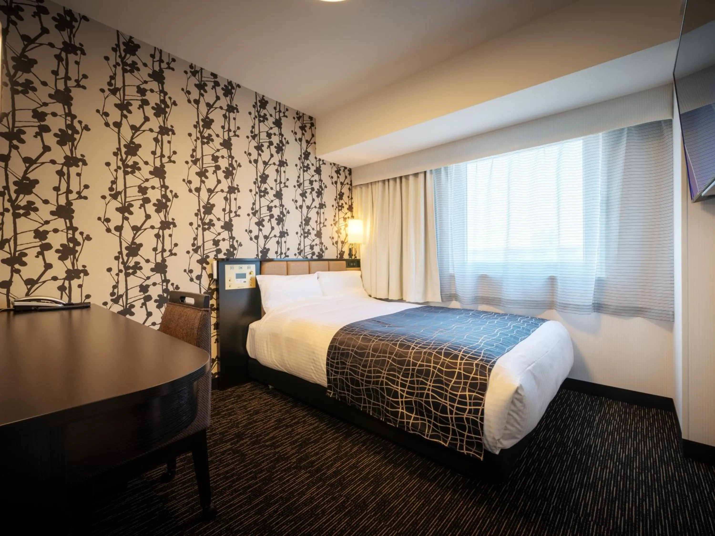 Photo of the whole room, Bed in APA Hotel Ibaraki Koga Ekimae