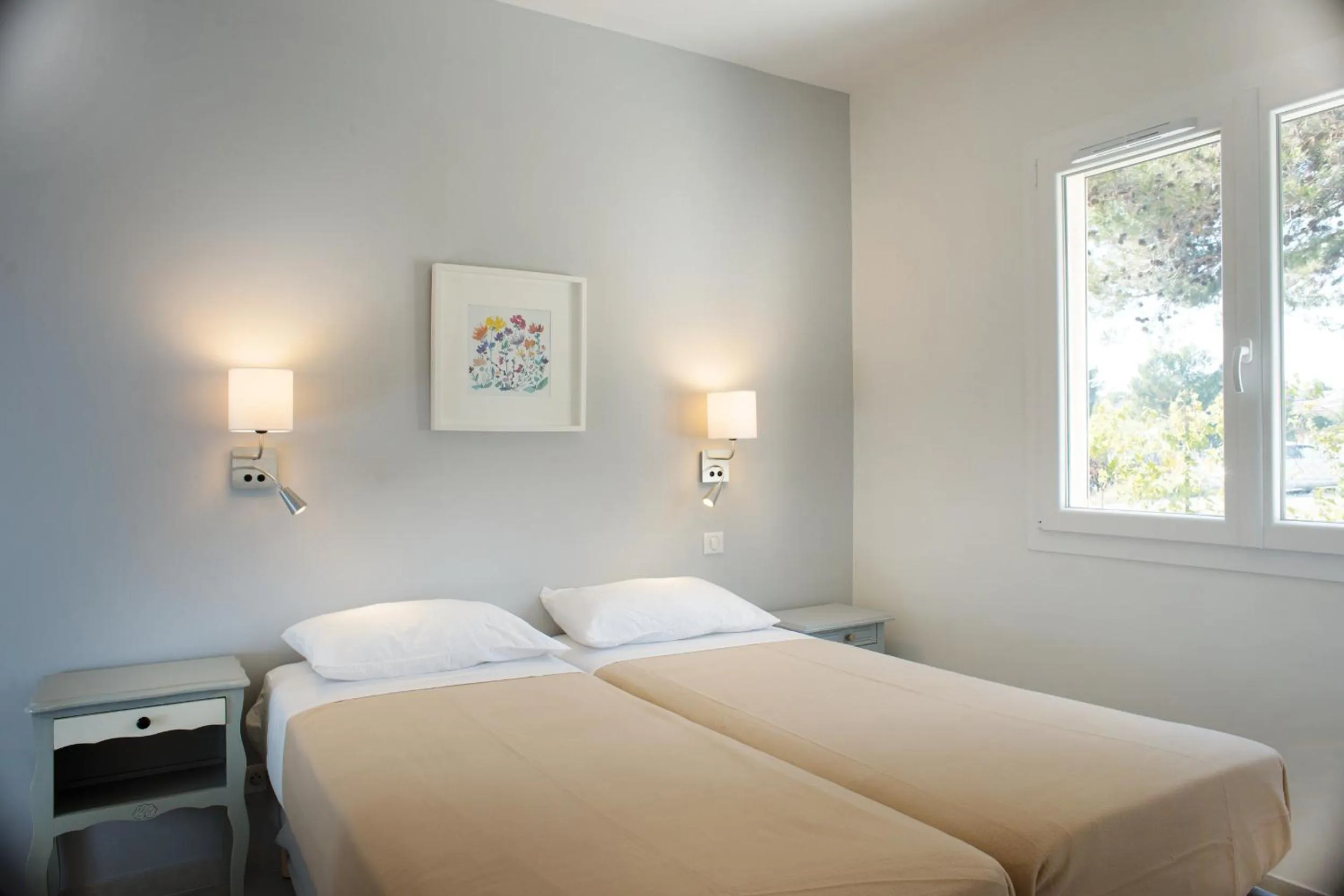 Bed in Appartements des Joncas