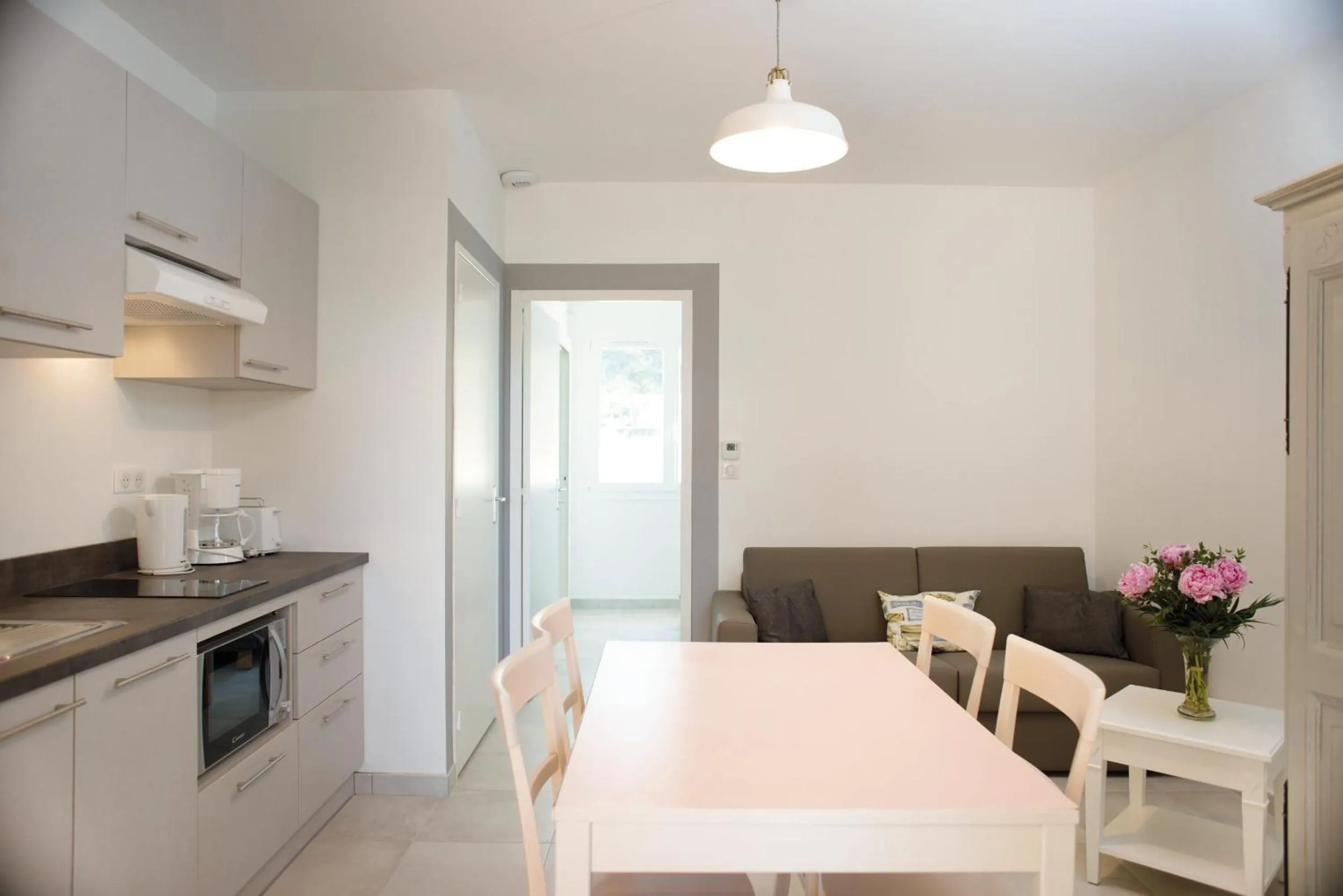 Kitchen or kitchenette in Appartements des Joncas