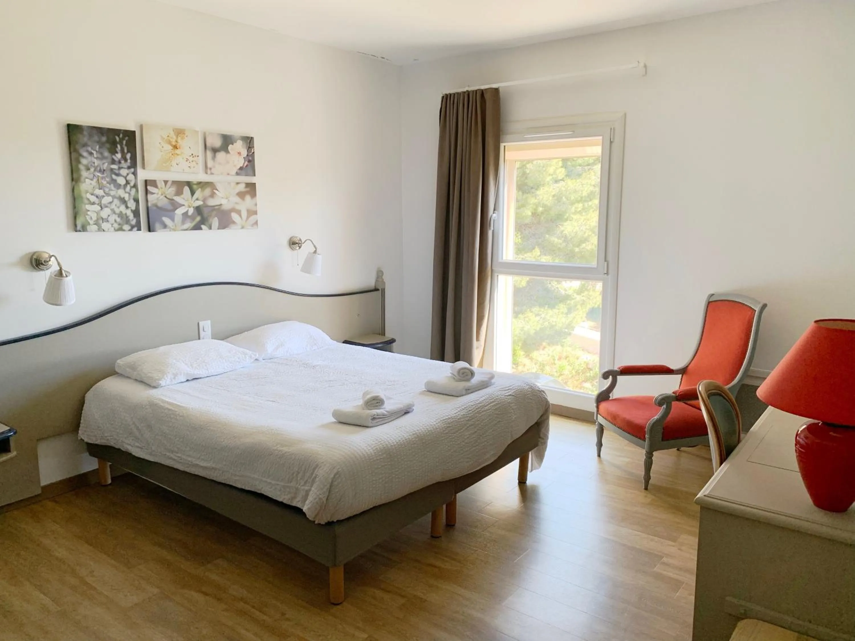 Bed in Appartements des Joncas