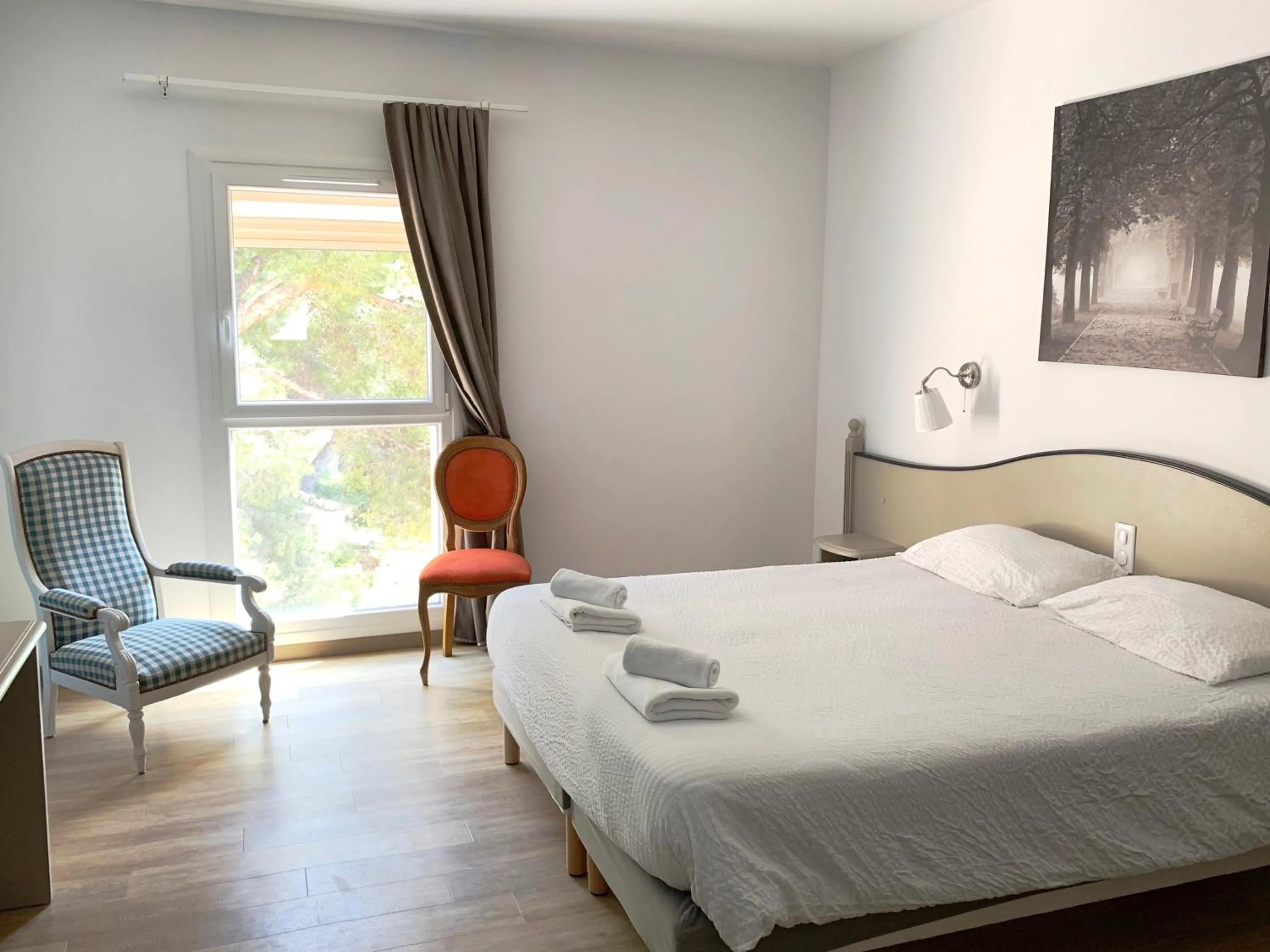 Bed in Appartements des Joncas