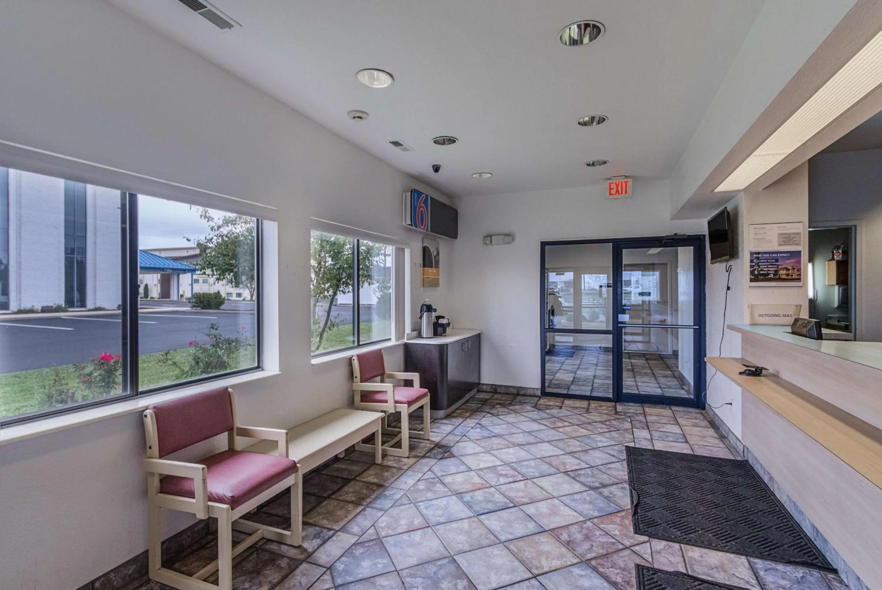 Property logo or sign in Motel 6-Kokomo, IN