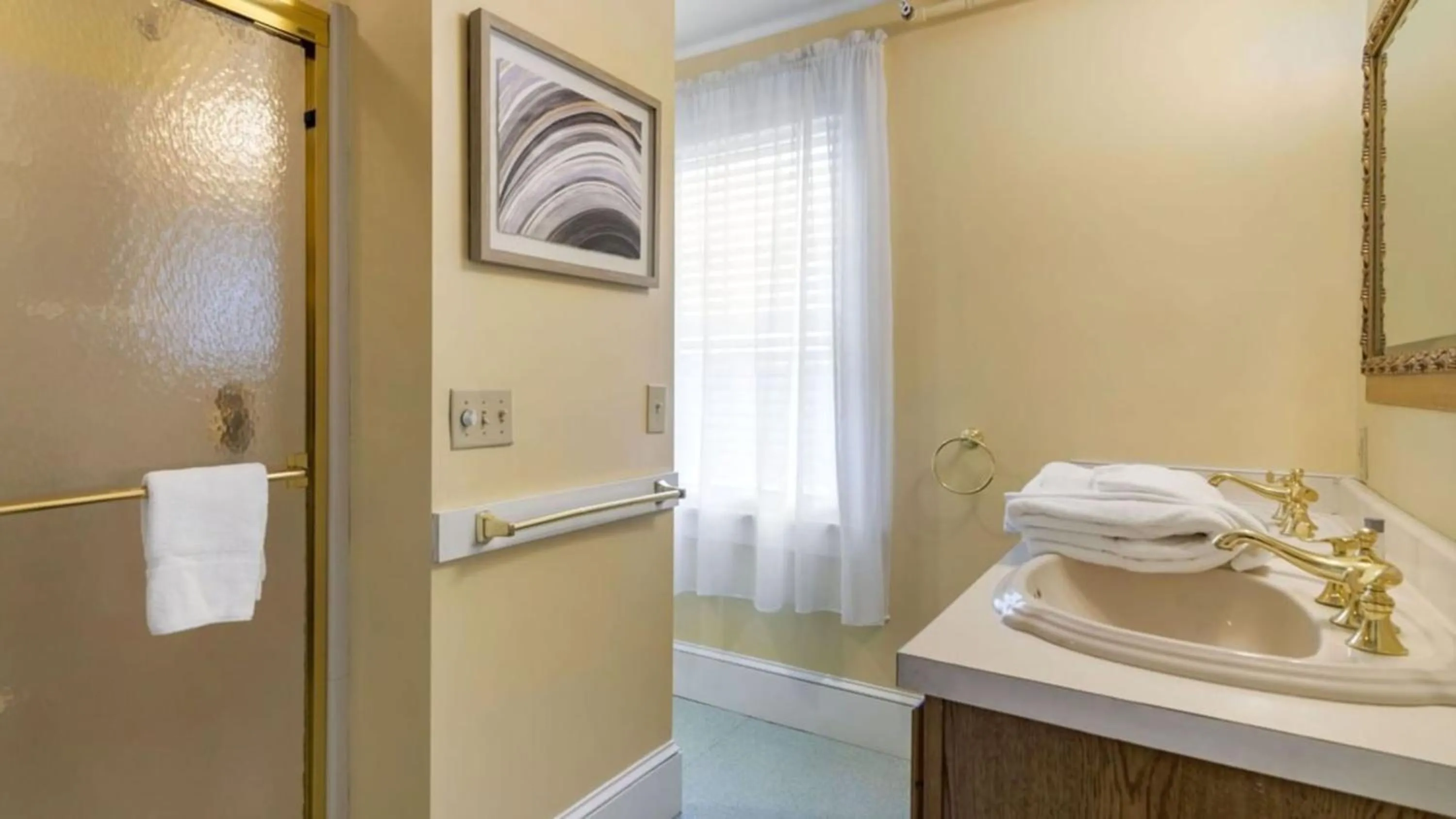 Shower in The Bethel Resort & Suites