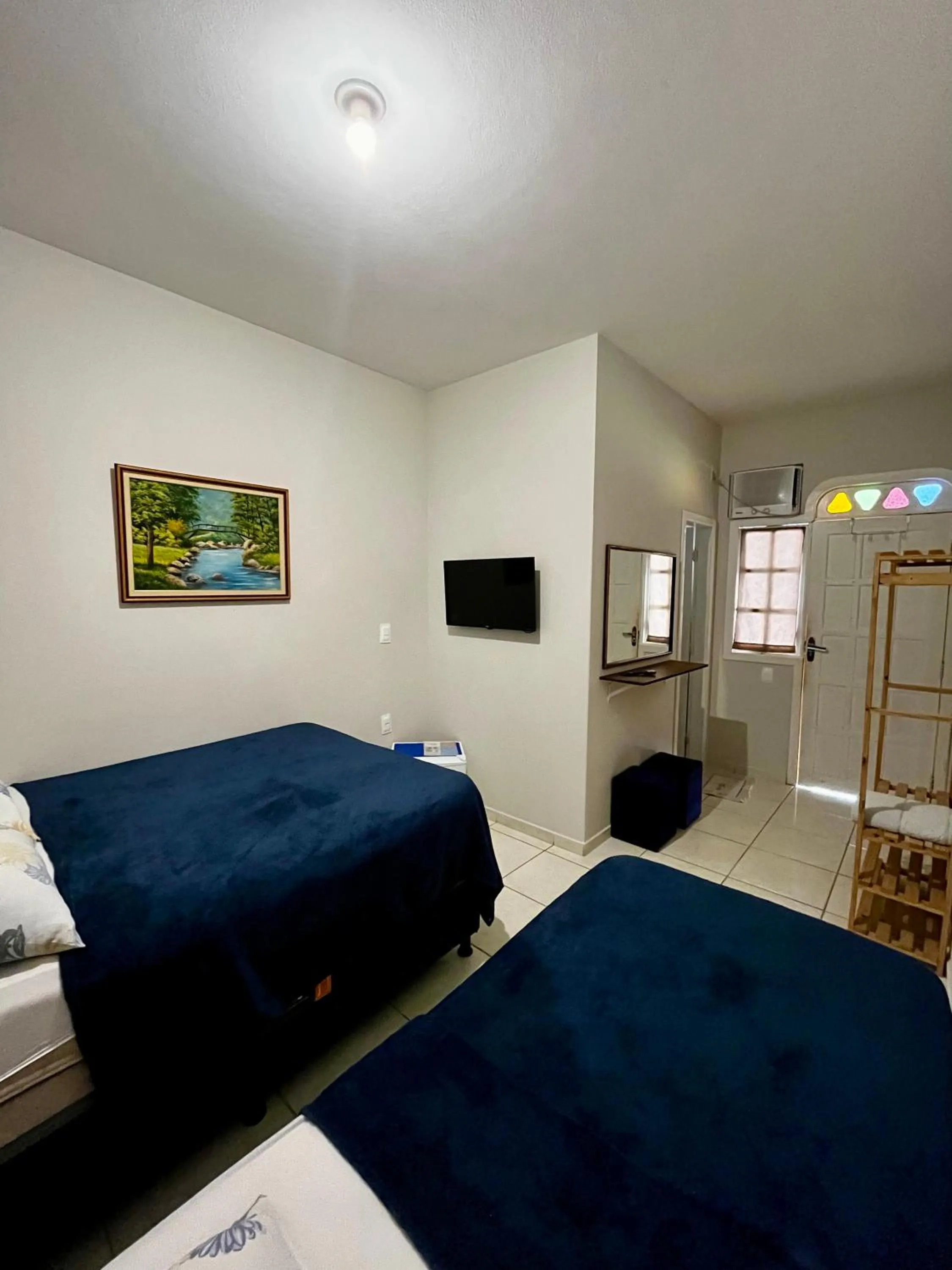 Bed in Pousada da Rose