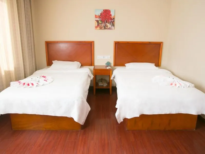 Bed in GreenTree Inn Rizhao West Station Suning Plaza