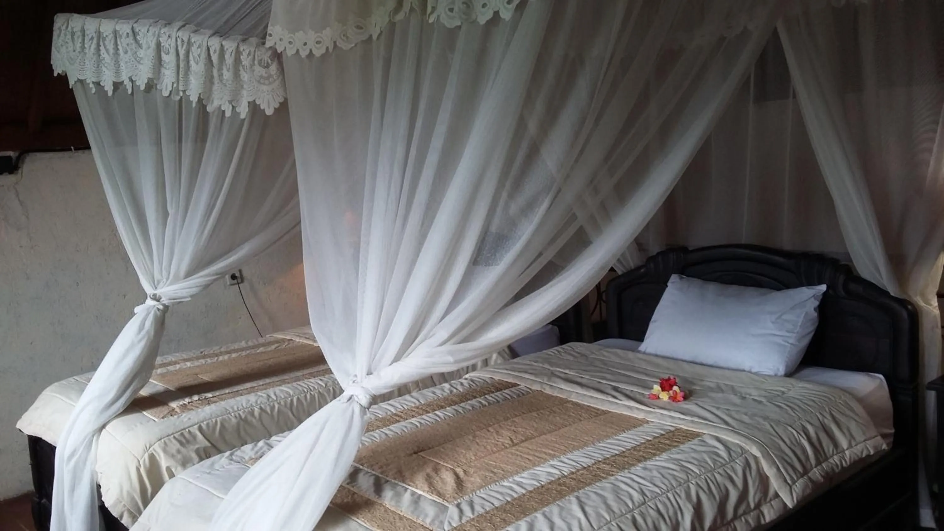 Bed in Three Brothers Bobby's Villas