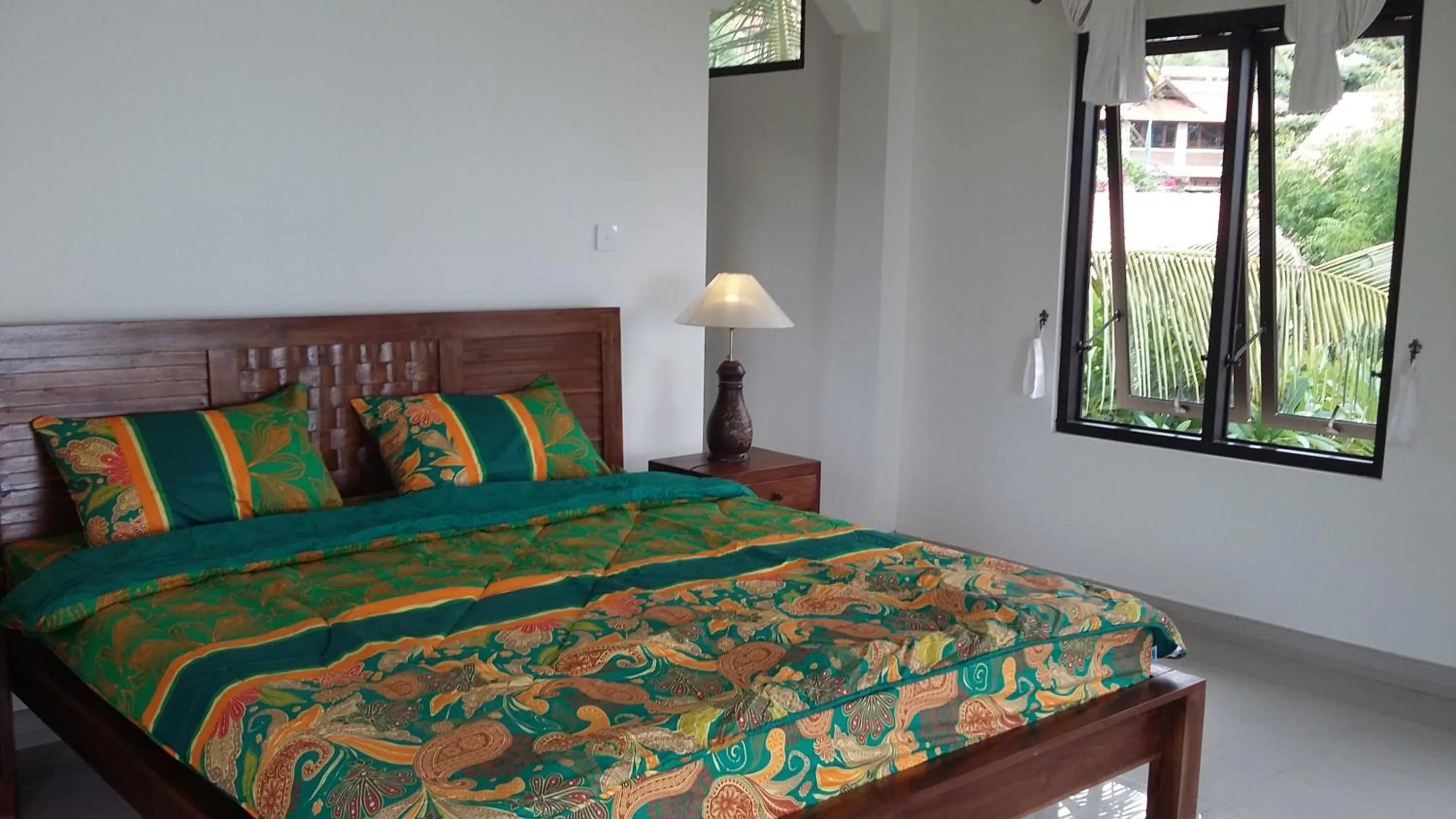 Bed in Three Brothers Bobby's Villas